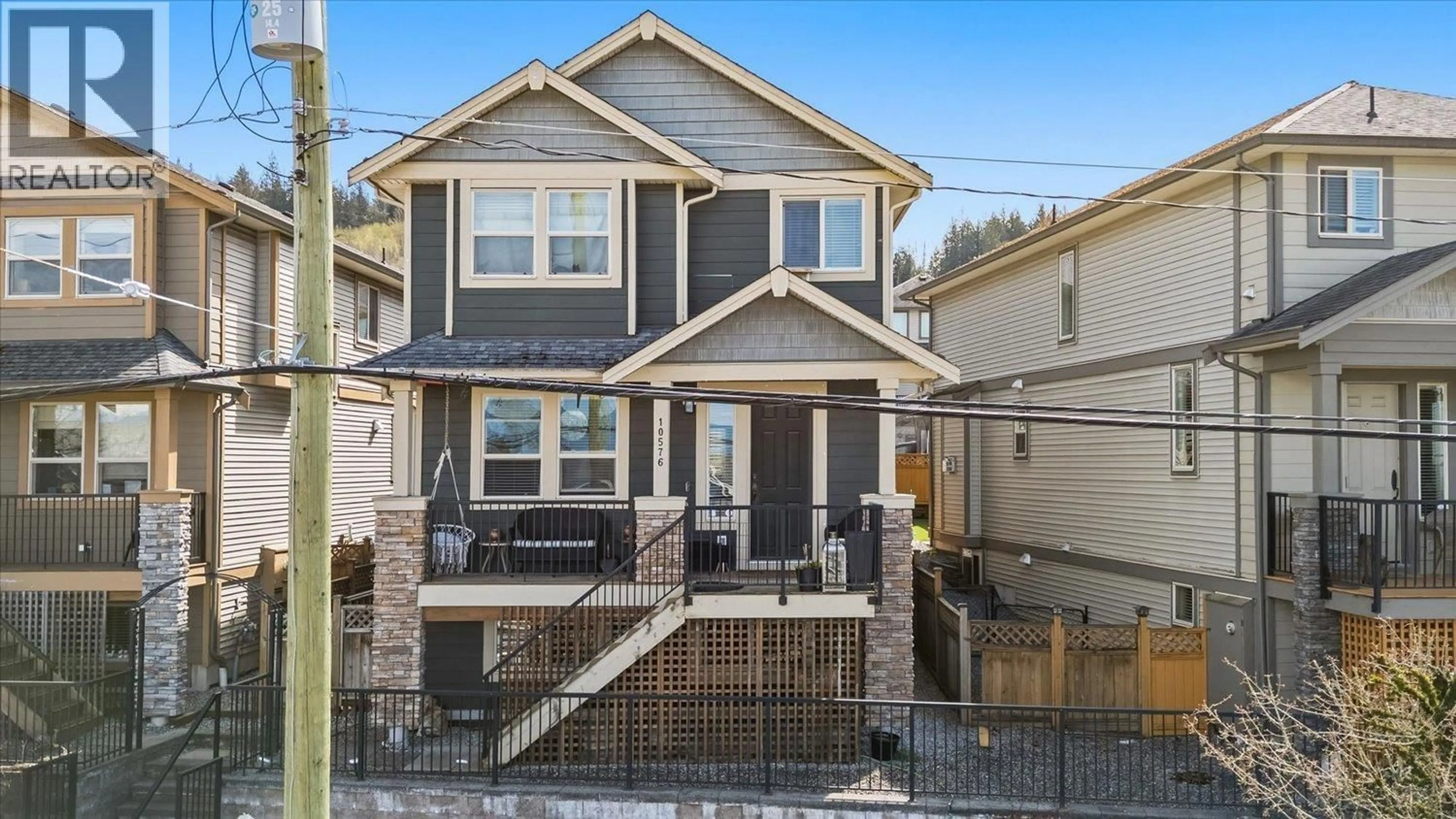 Home with vinyl exterior material, street for 10576 JACKSON ROAD, Maple Ridge British Columbia V2W0G2