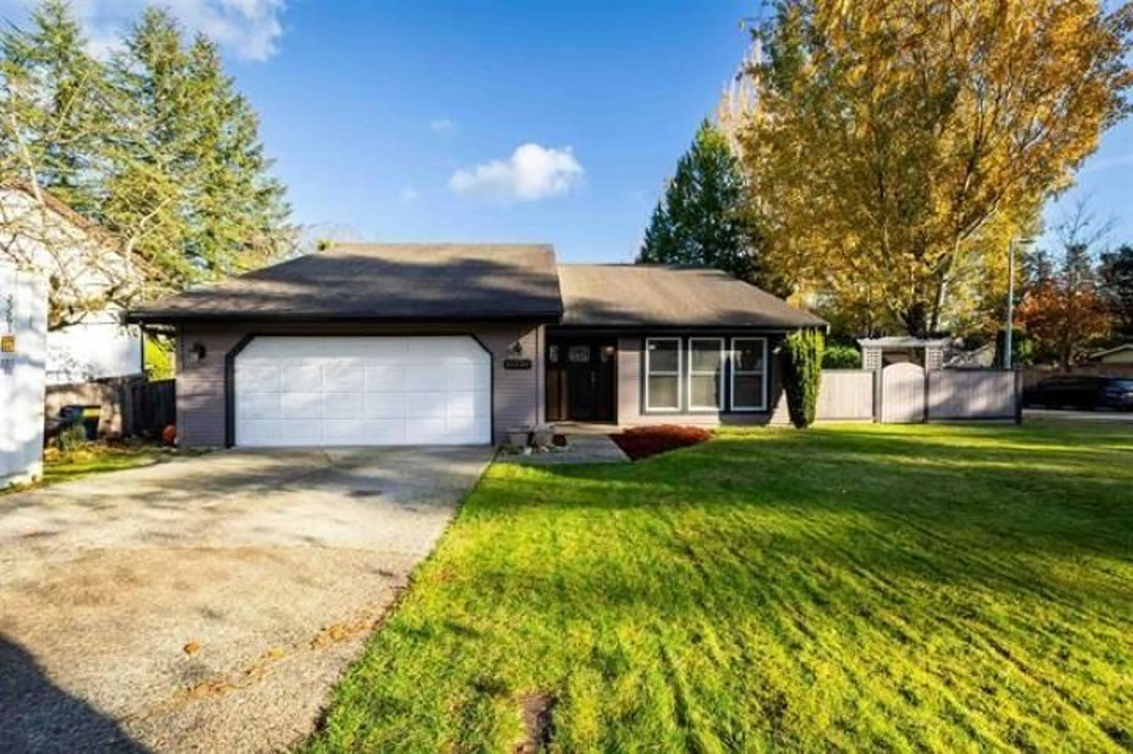 Home with vinyl exterior material, street for 10230 158 STREET, Surrey British Columbia V4N2M3