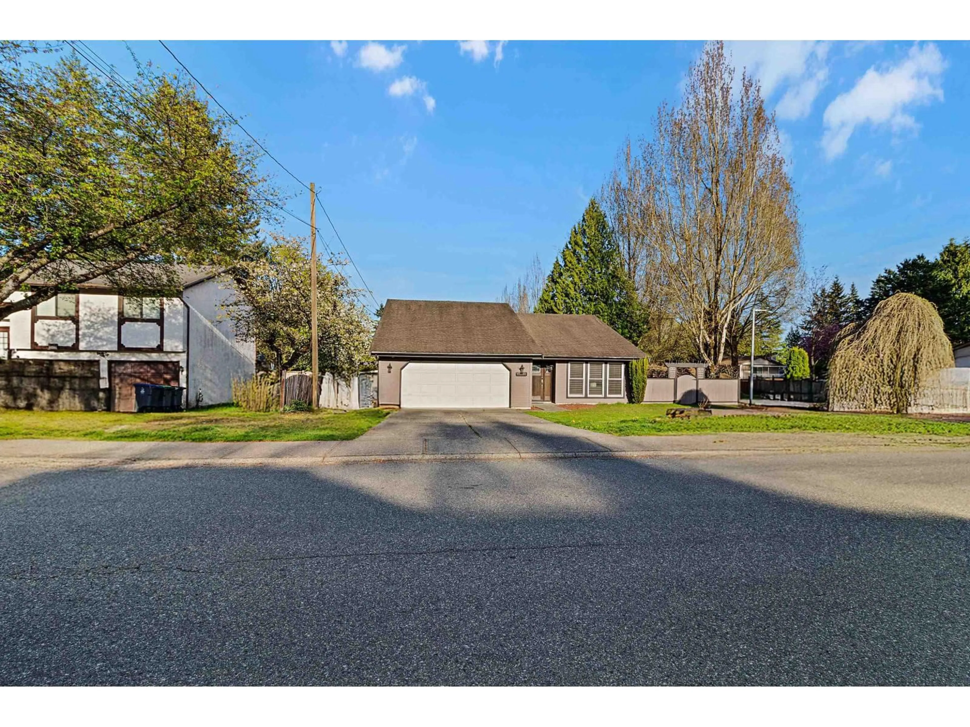 A pic from outside/outdoor area/front of a property/back of a property/a pic from drone, street for 10230 158 STREET, Surrey British Columbia V4N2M3