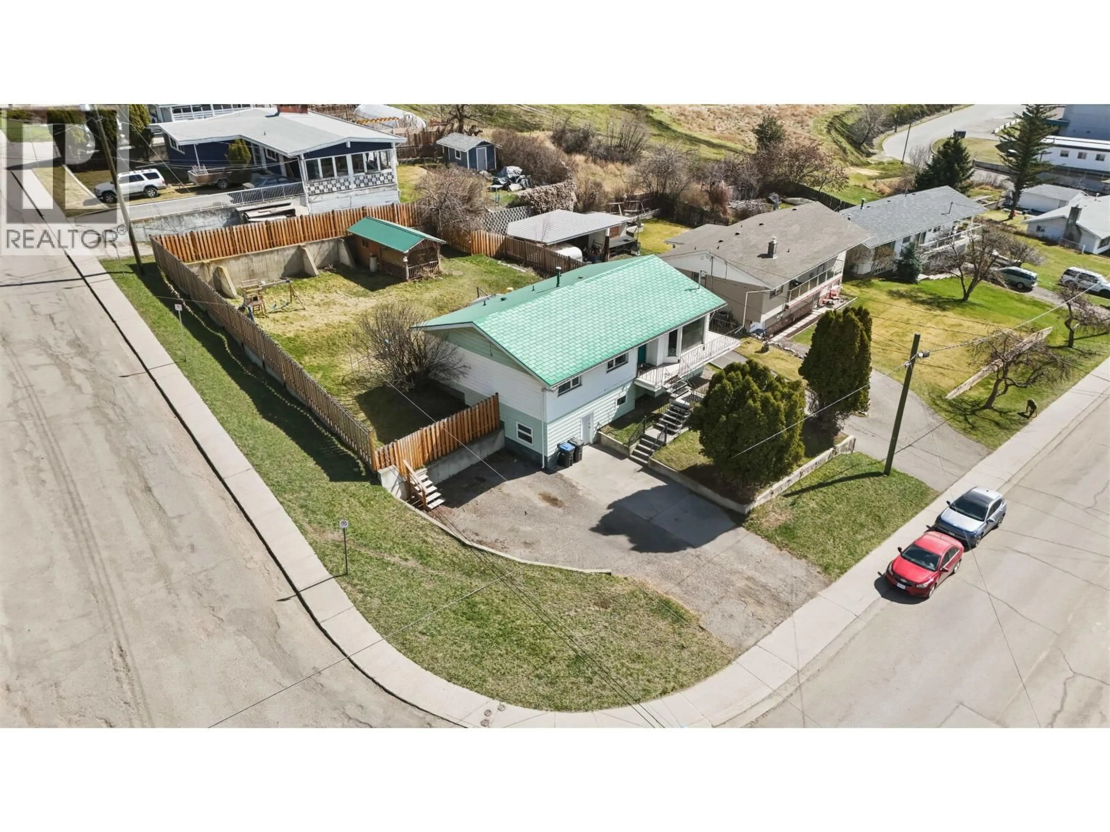 A pic from outside/outdoor area/front of a property/back of a property/a pic from drone, street for 496 SIXTH AVENUE, Williams Lake British Columbia V2G2G7