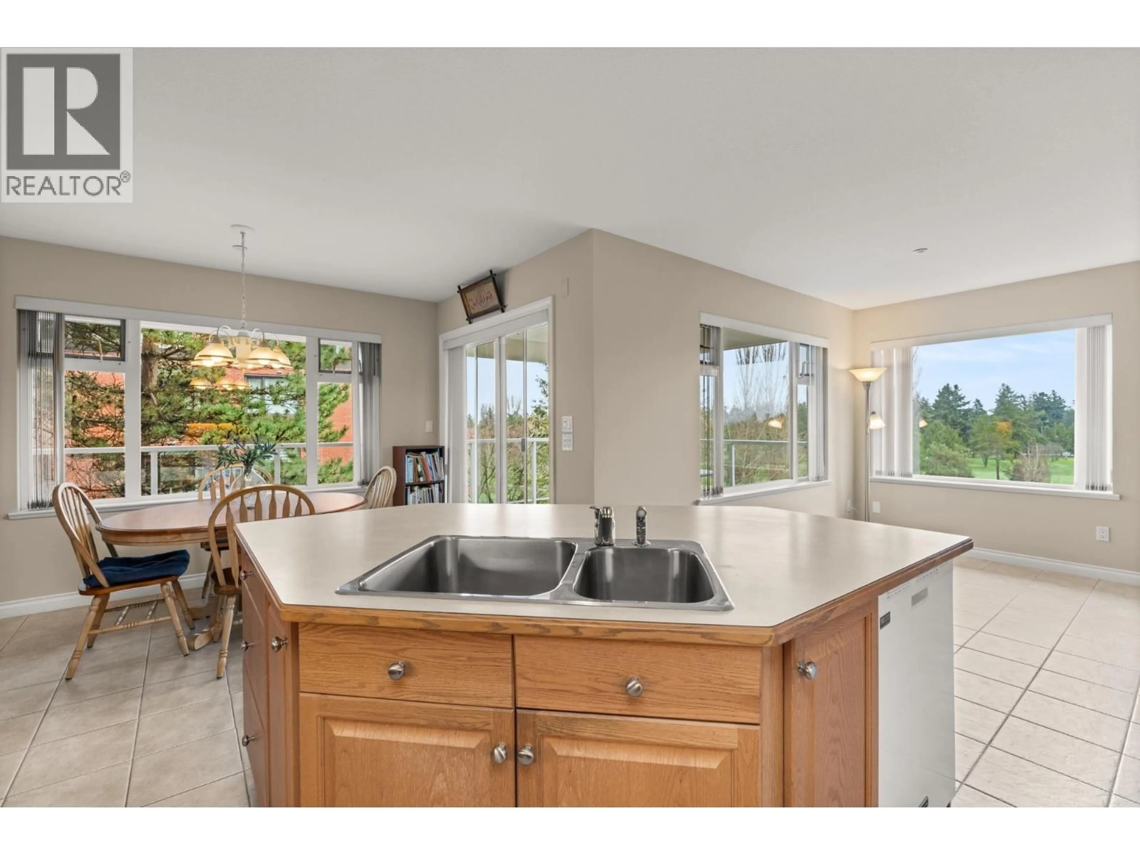 Open concept kitchen, ceramic/tile floor for 203 - 1330 HUNTER ROAD, Delta British Columbia V4L1Y8
