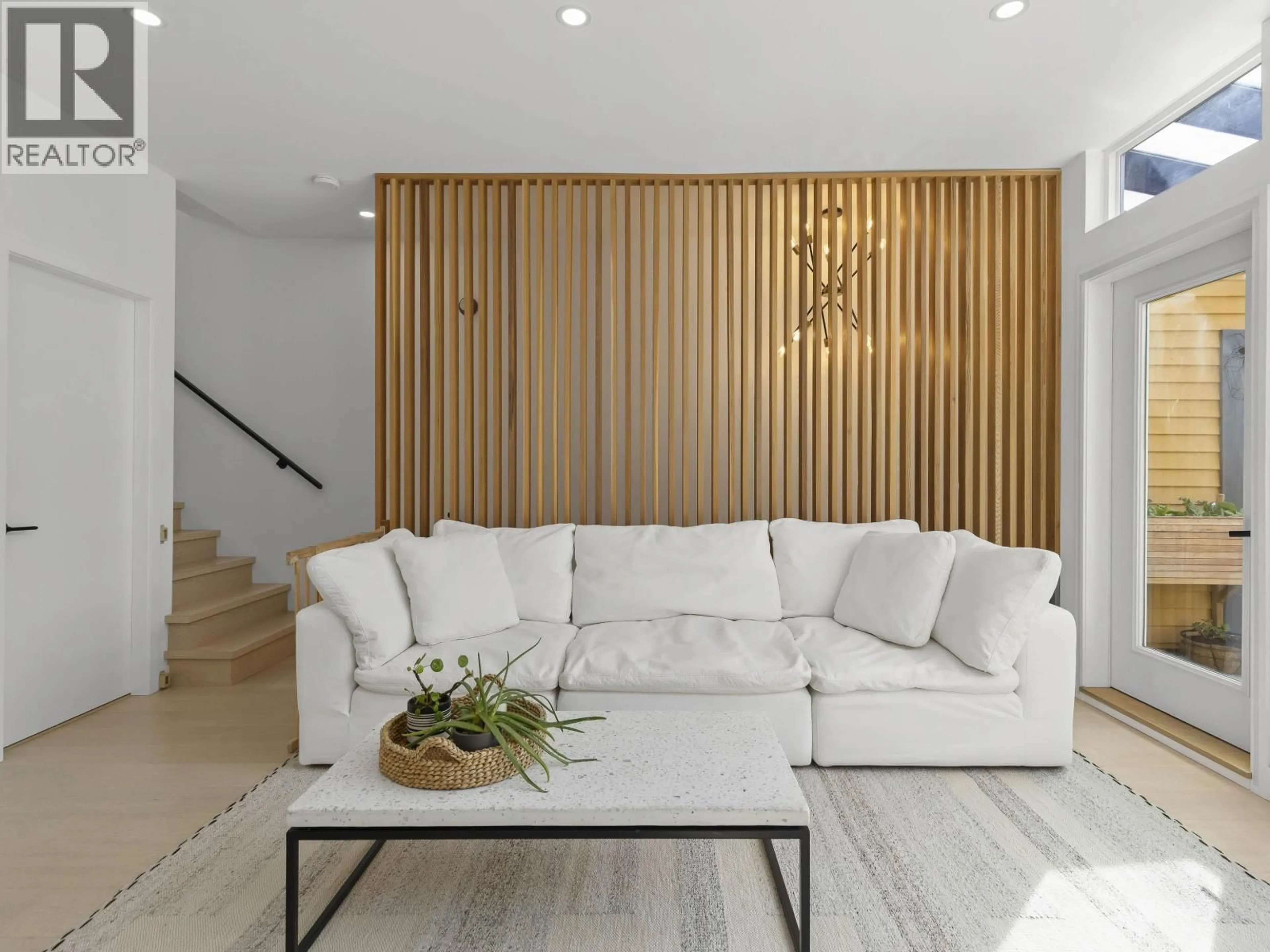 Living room with furniture, wood/laminate floor for 1065 PENDER STREET, Vancouver British Columbia V6A4H9