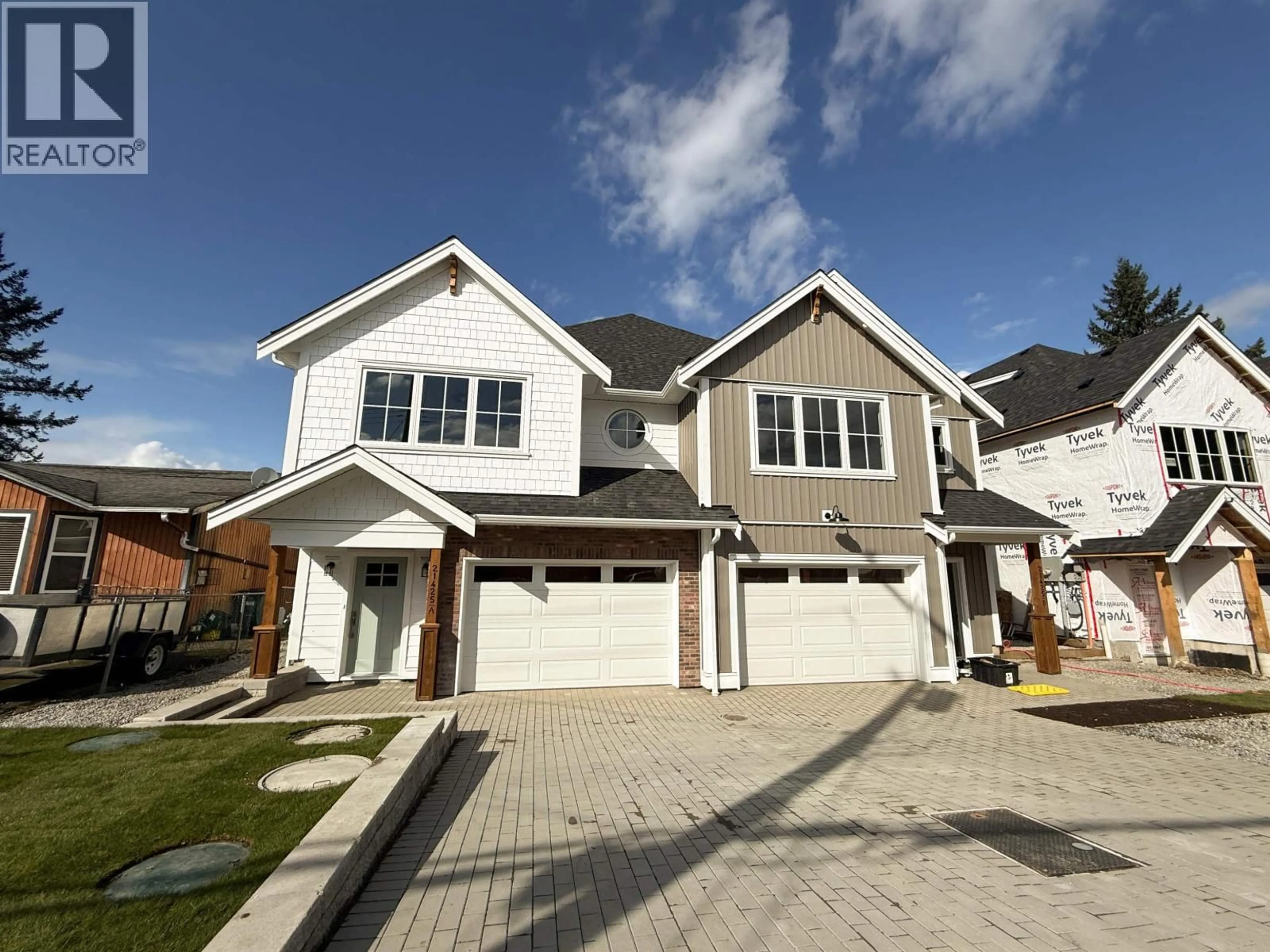 Home with vinyl exterior material, street for A - 21425 121 AVENUE, Maple Ridge British Columbia V2X3S5