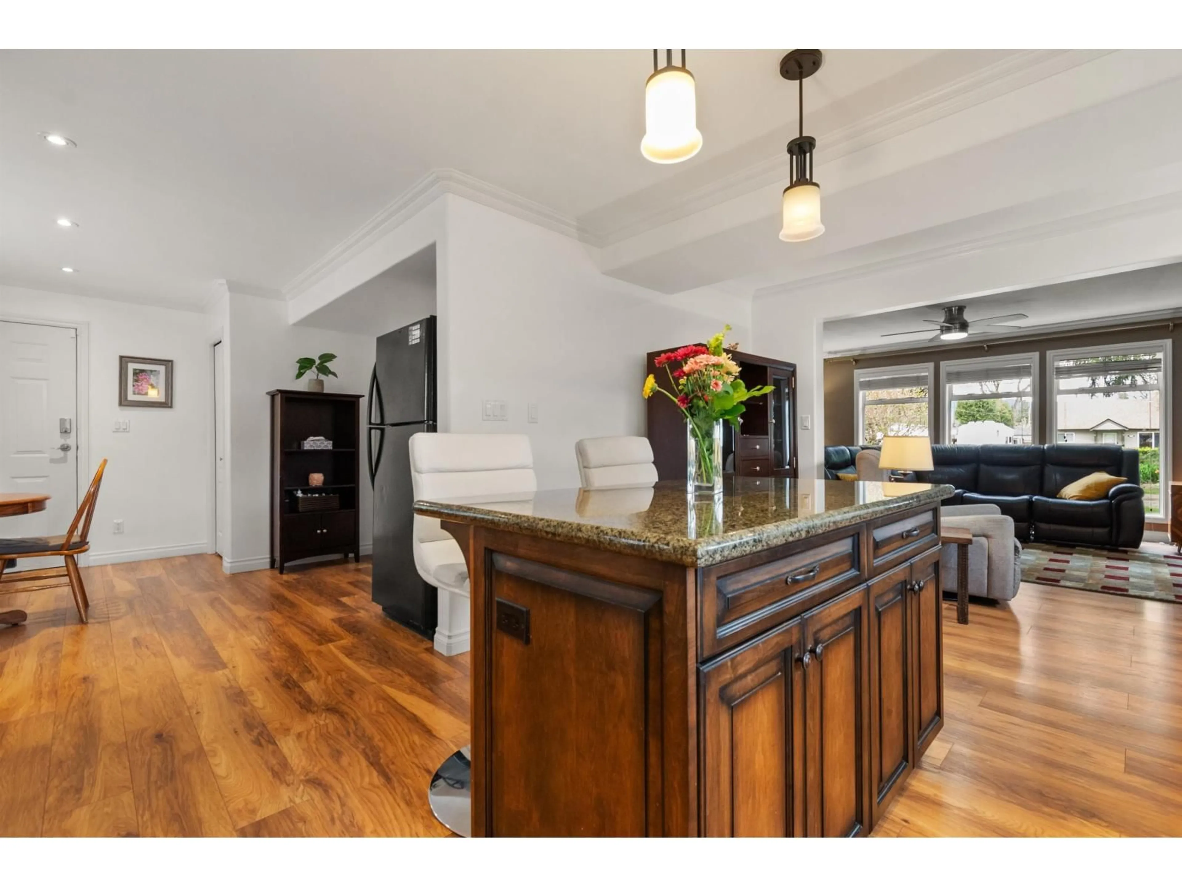 Open concept kitchen, wood/laminate floor for 46000 BONNY AVENUE, Chilliwack British Columbia V2P3H6