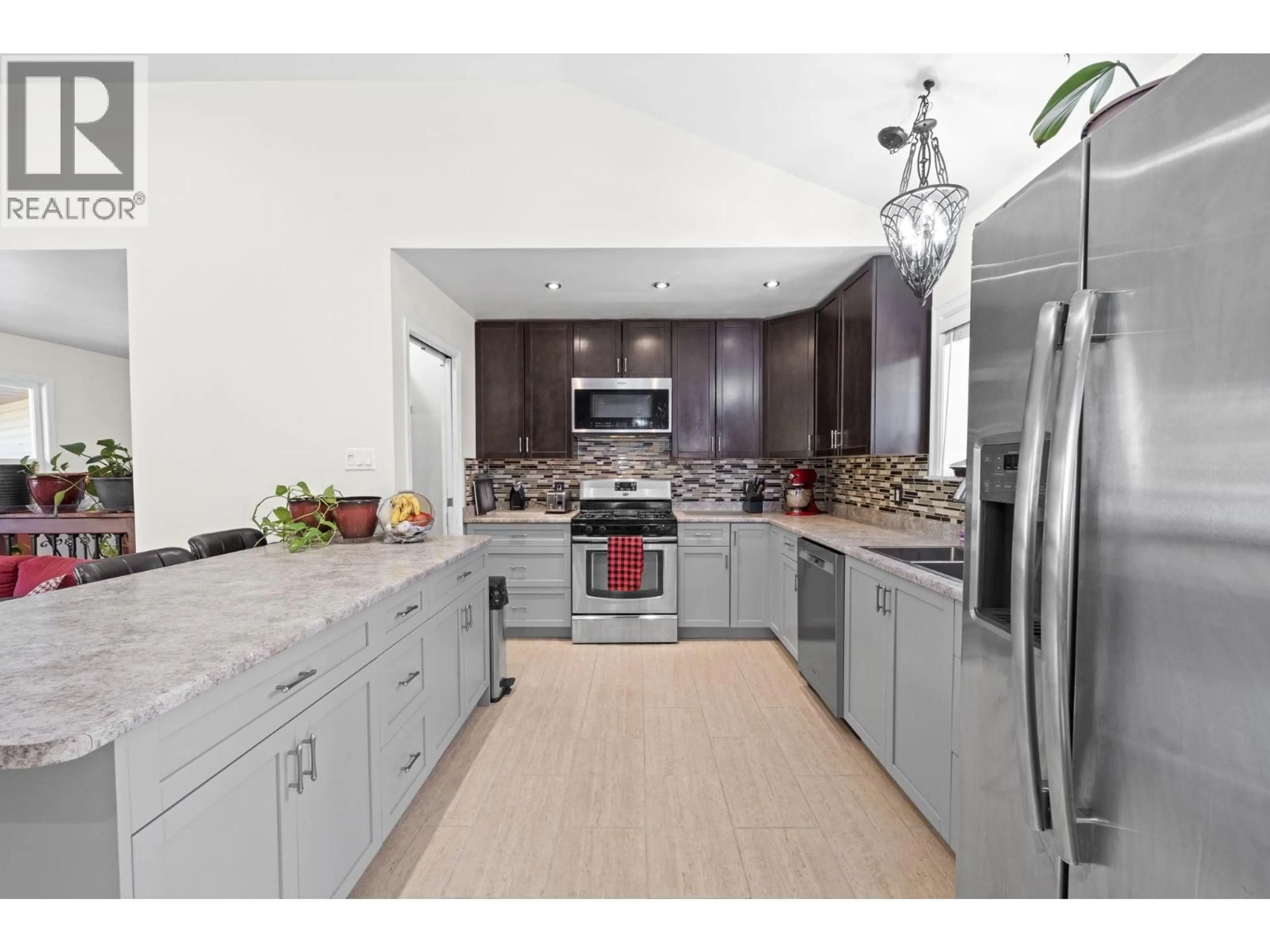 Open concept kitchen, ceramic/tile floor for 21796 HOWISON AVENUE, Maple Ridge British Columbia V2X2W6