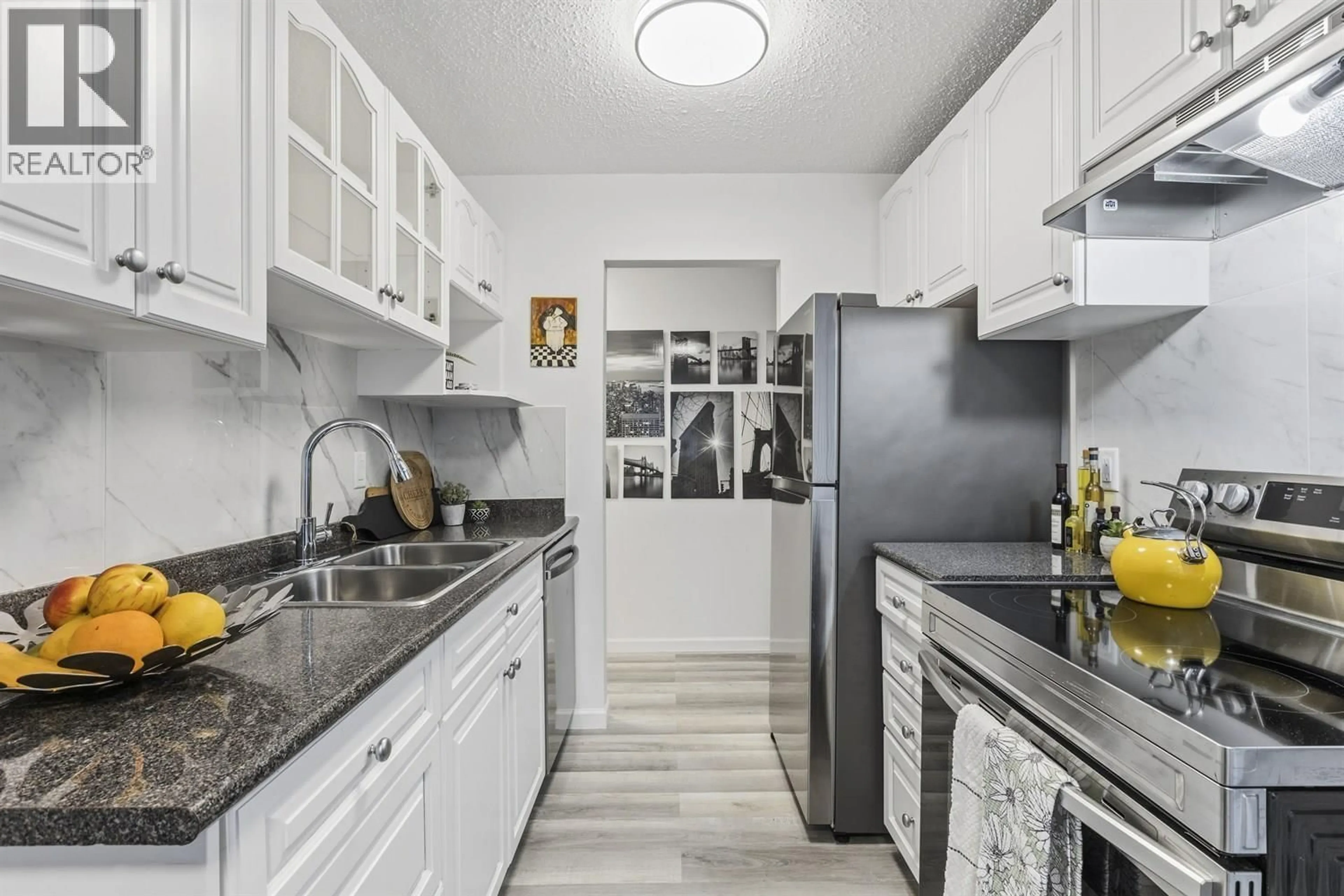 Standard kitchen, ceramic/tile floor for 104 - 425 ASH STREET, New Westminster British Columbia V3M3N2