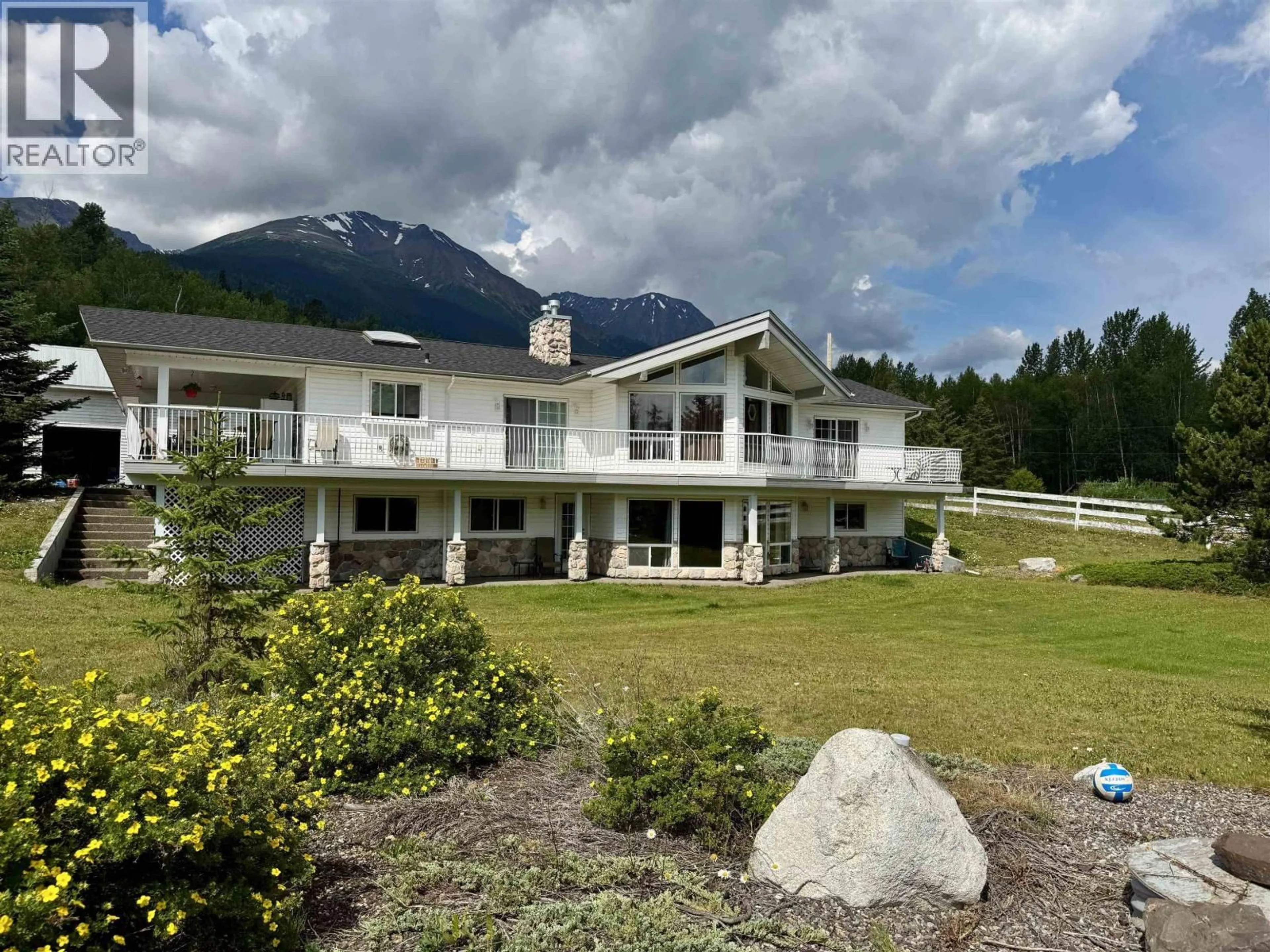A pic from outside/outdoor area/front of a property/back of a property/a pic from drone, mountain view for 2389 BALSAM ROAD, Smithers British Columbia V0J2N2