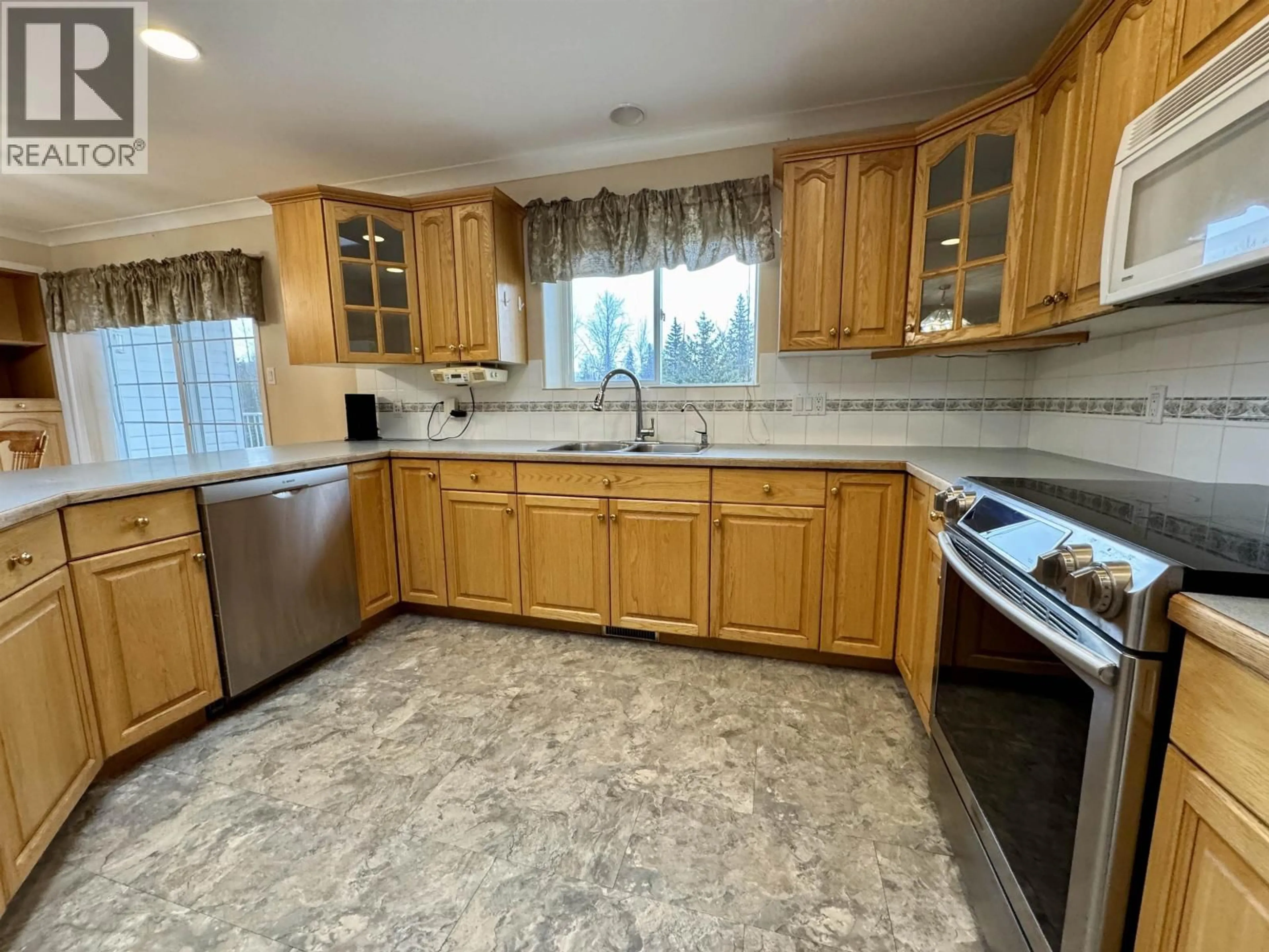 Standard kitchen, ceramic/tile floor for 2389 BALSAM ROAD, Smithers British Columbia V0J2N2