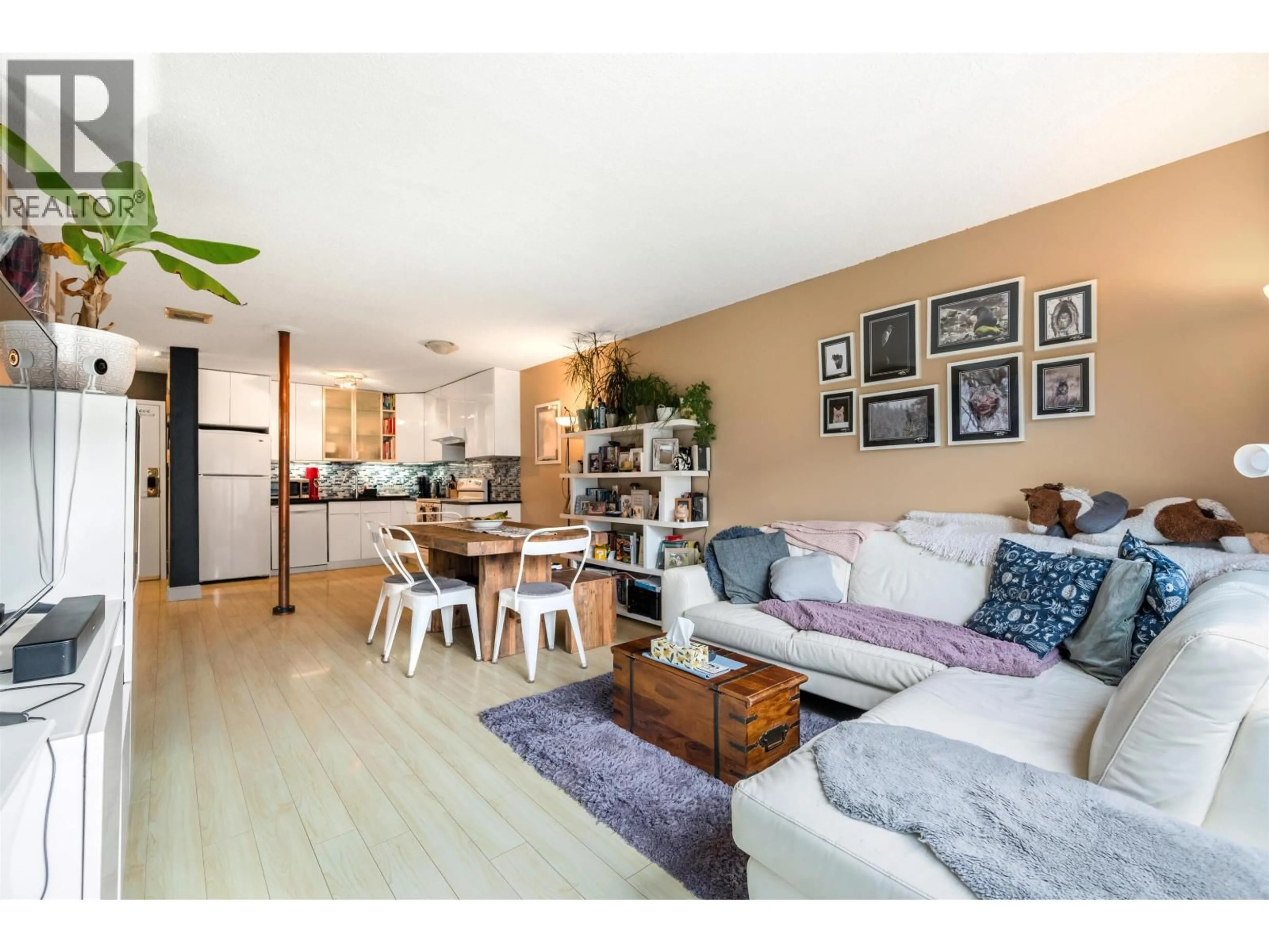 Living room with furniture, wood/laminate floor for 208 - 808 8 AVENUE, Vancouver British Columbia V5T1T5