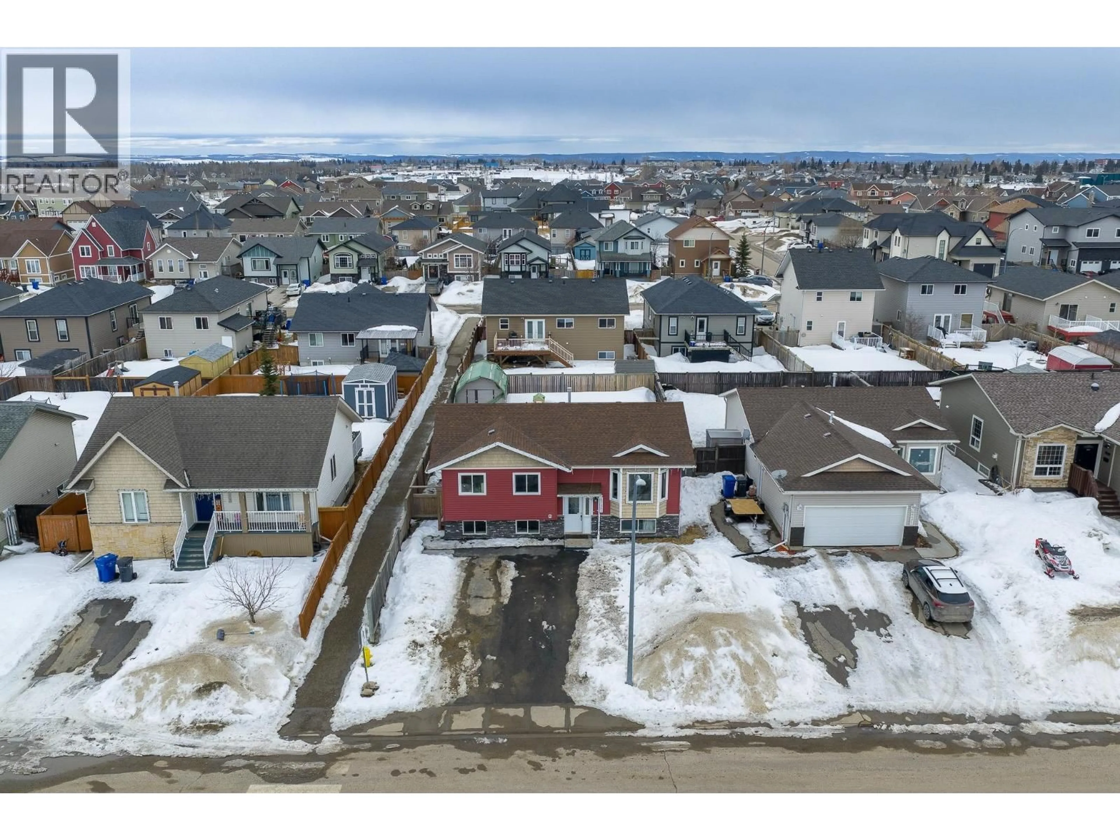 A pic from outside/outdoor area/front of a property/back of a property/a pic from drone, street for 8727 113A AVENUE, Fort St. John British Columbia V1J0C4