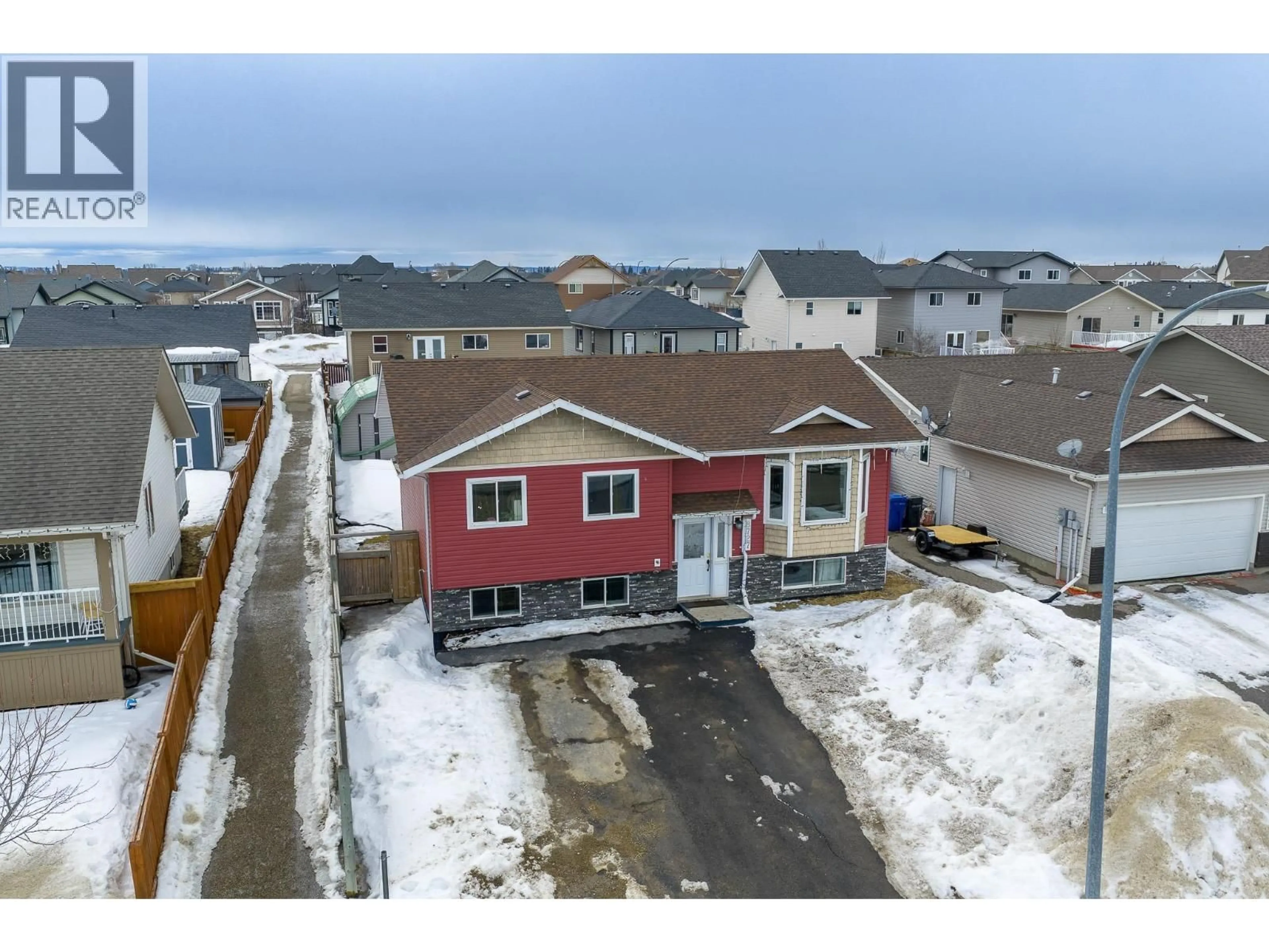 A pic from outside/outdoor area/front of a property/back of a property/a pic from drone, unknown for 8727 113A AVENUE, Fort St. John British Columbia V1J0C4