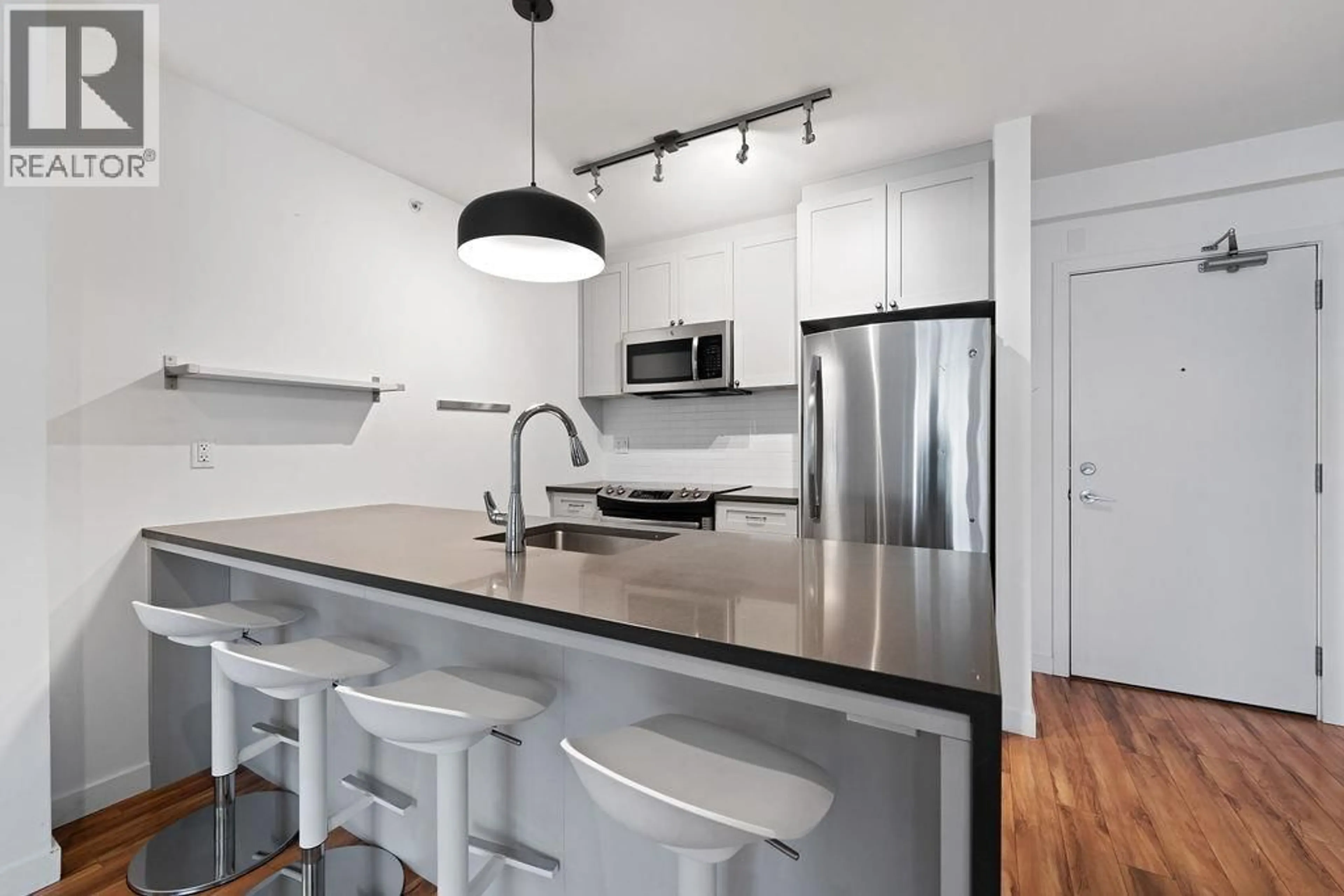 Open concept kitchen, unknown for 317 - 289 6TH AVENUE, Vancouver British Columbia V5T0E9