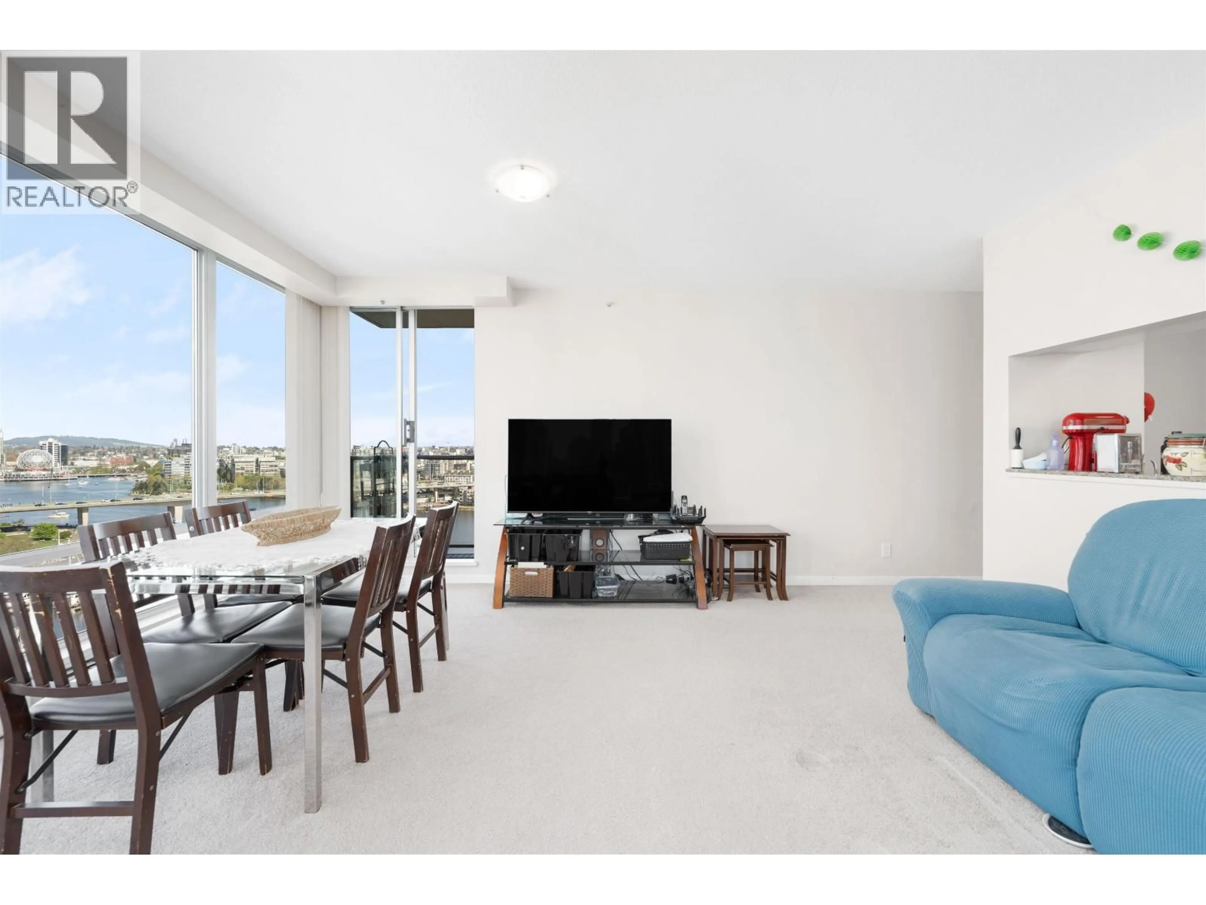 Living room with furniture, unknown for 1906 - 1228 MARINASIDE CRESCENT, Vancouver British Columbia V6Z2W4