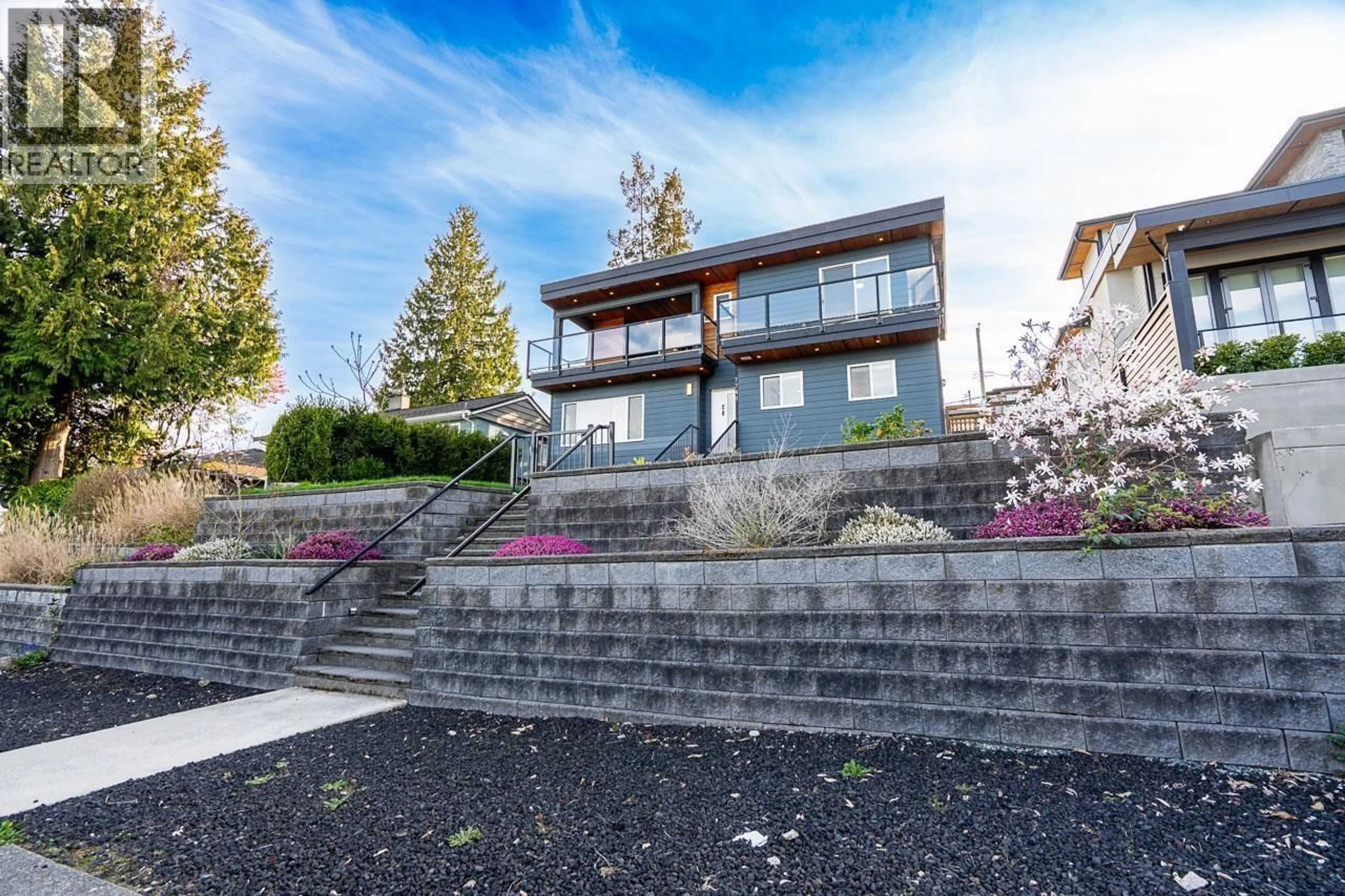 Home with brick exterior material, mountain view for 7749 LEE STREET, Burnaby British Columbia V3N4B9