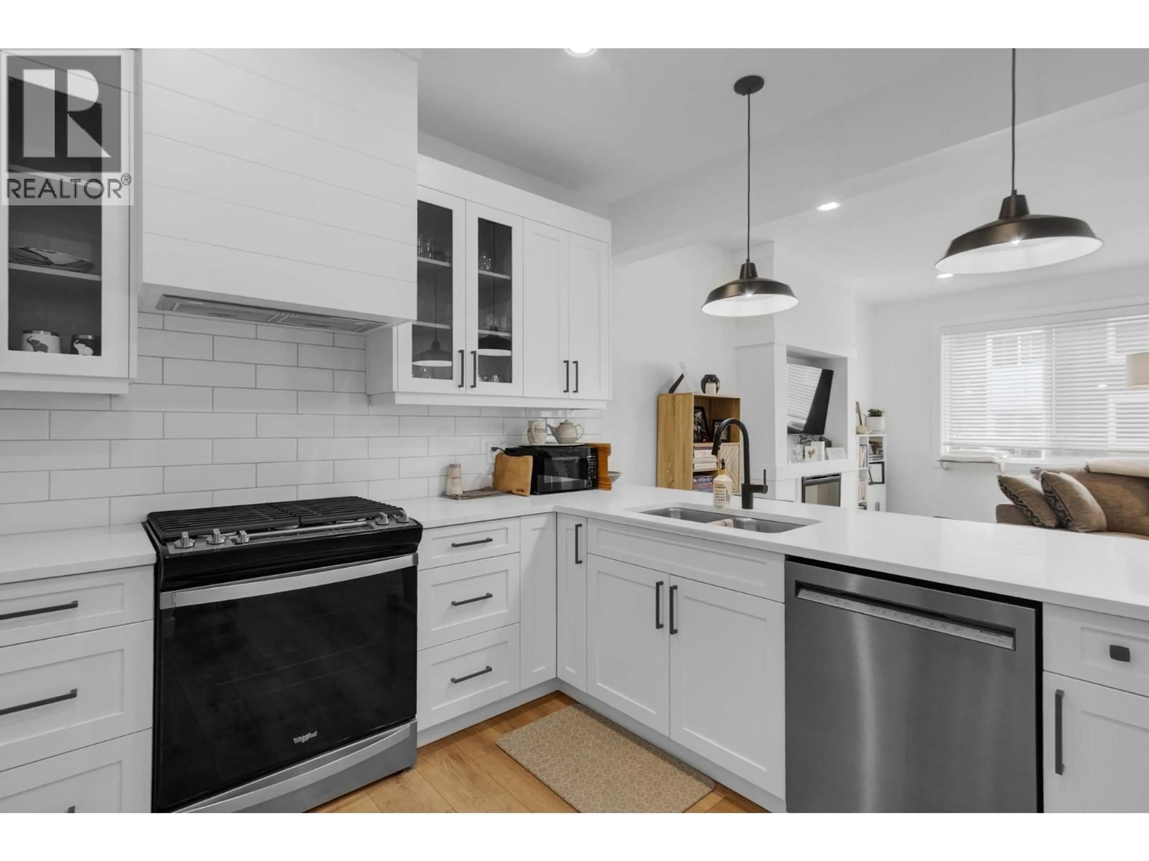 Open concept kitchen, ceramic/tile floor for 707 - 4274 22ND AVENUE, Prince George British Columbia V2N0J4