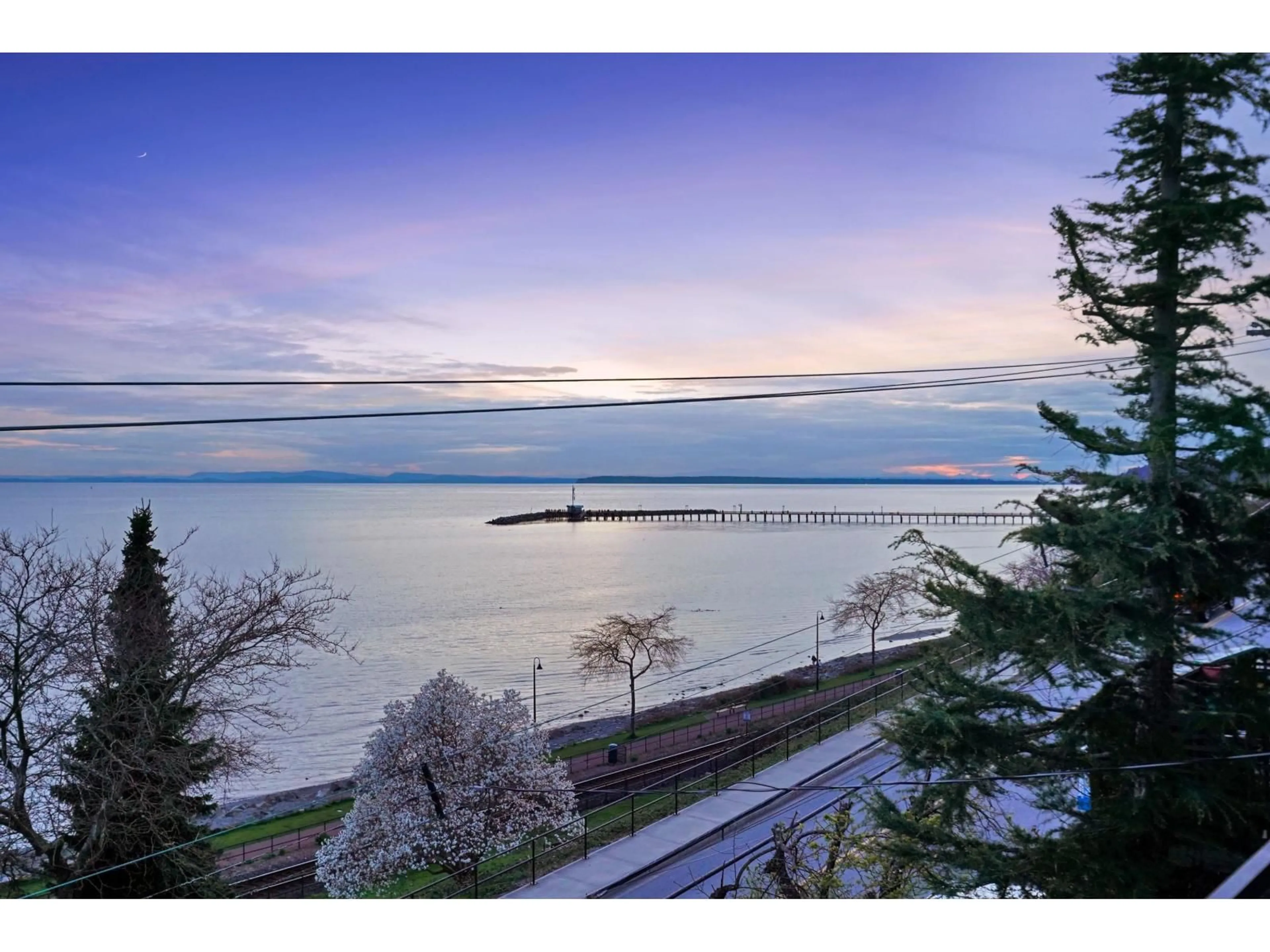 A pic from outside/outdoor area/front of a property/back of a property/a pic from drone, water/lake/river/ocean view for 15377 MARINE DRIVE, White Rock British Columbia V4B1C8