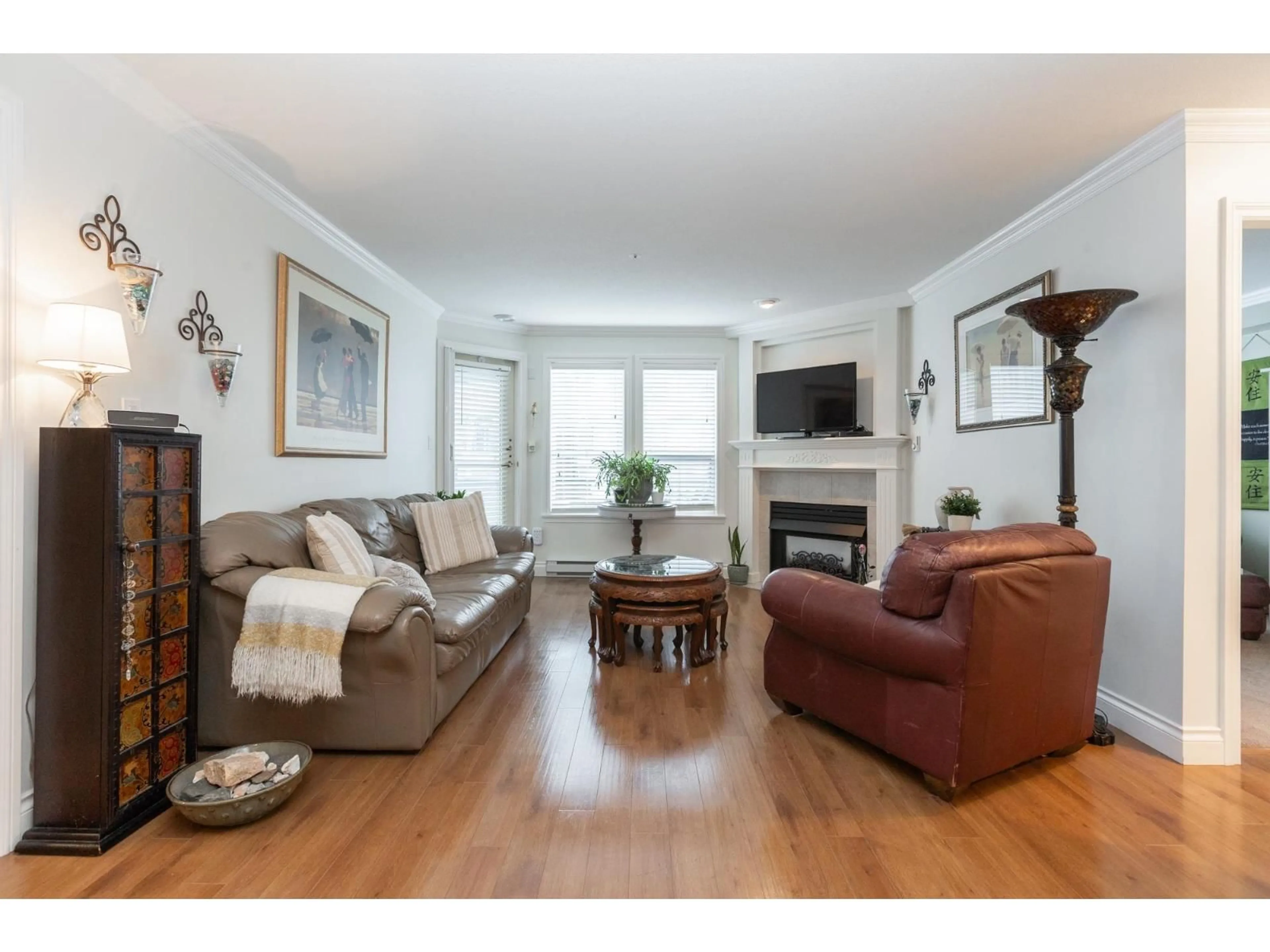 Living room with furniture, wood/laminate floor for 207 - 1576 MERKLIN STREET, White Rock British Columbia V4B5K2