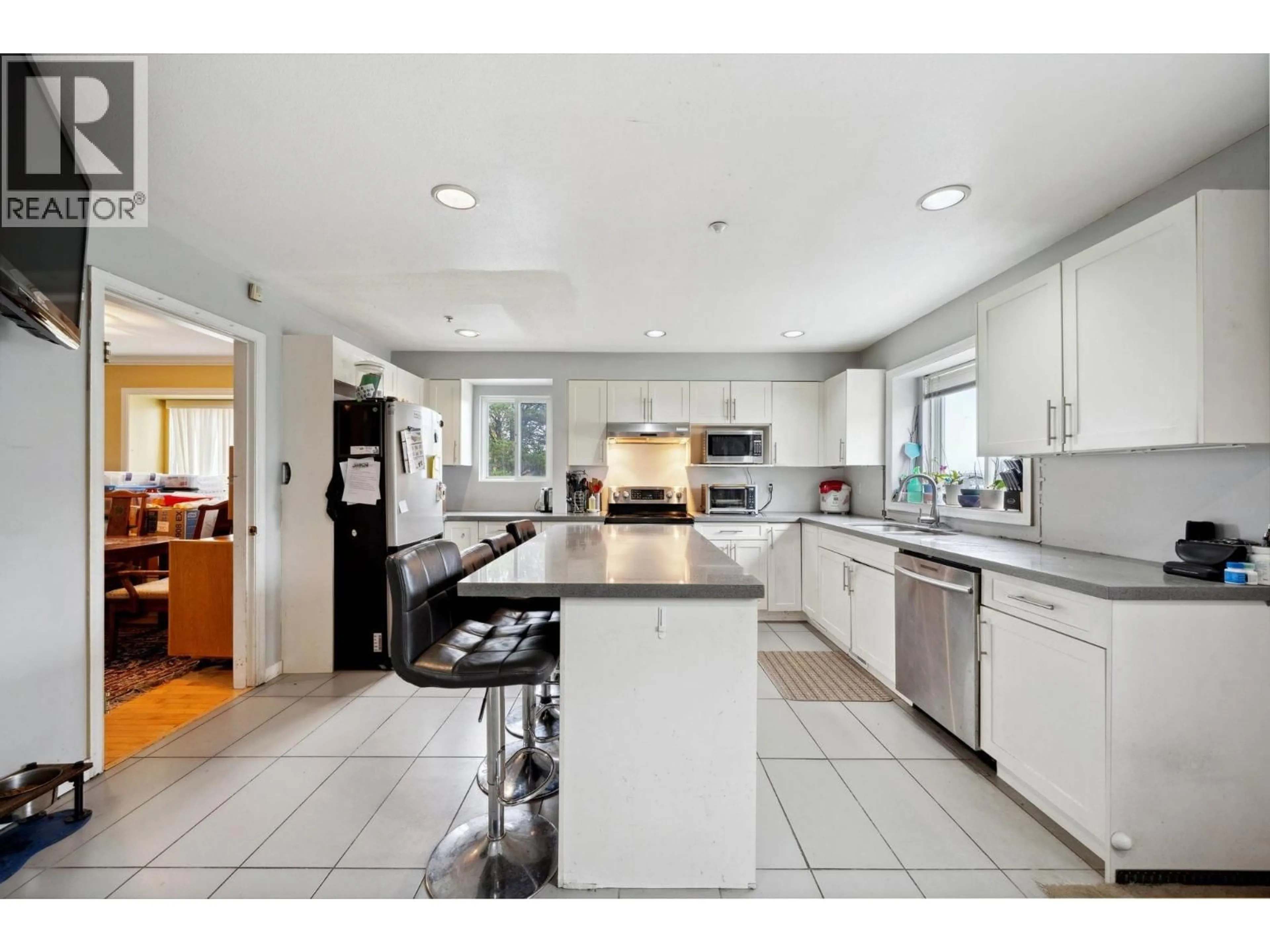 Open concept kitchen, ceramic/tile floor for 3298 2ND AVENUE, Vancouver British Columbia V5M1G3