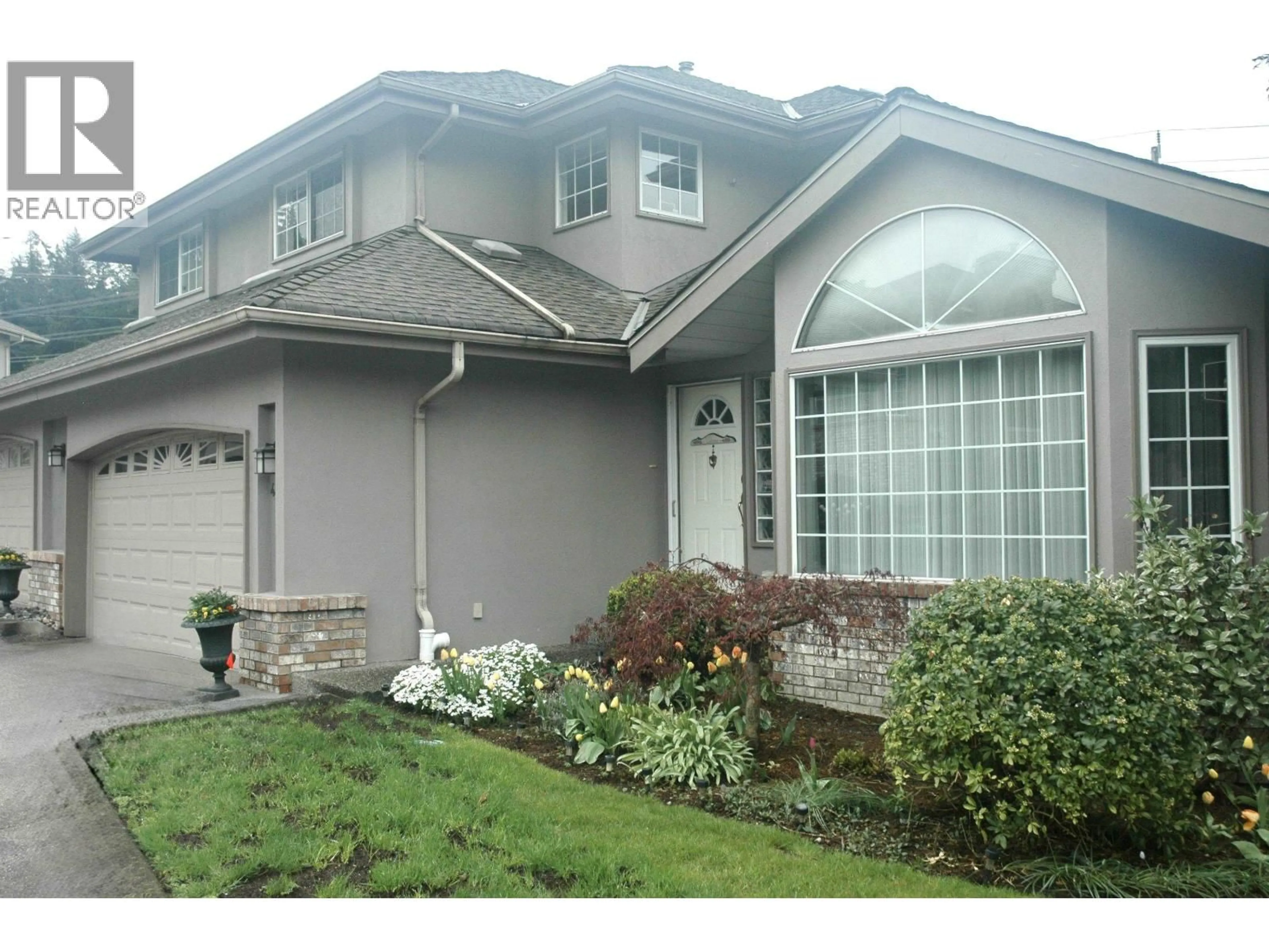 Home with vinyl exterior material, street for 433A BROMLEY STREET, Coquitlam British Columbia V3K6N7