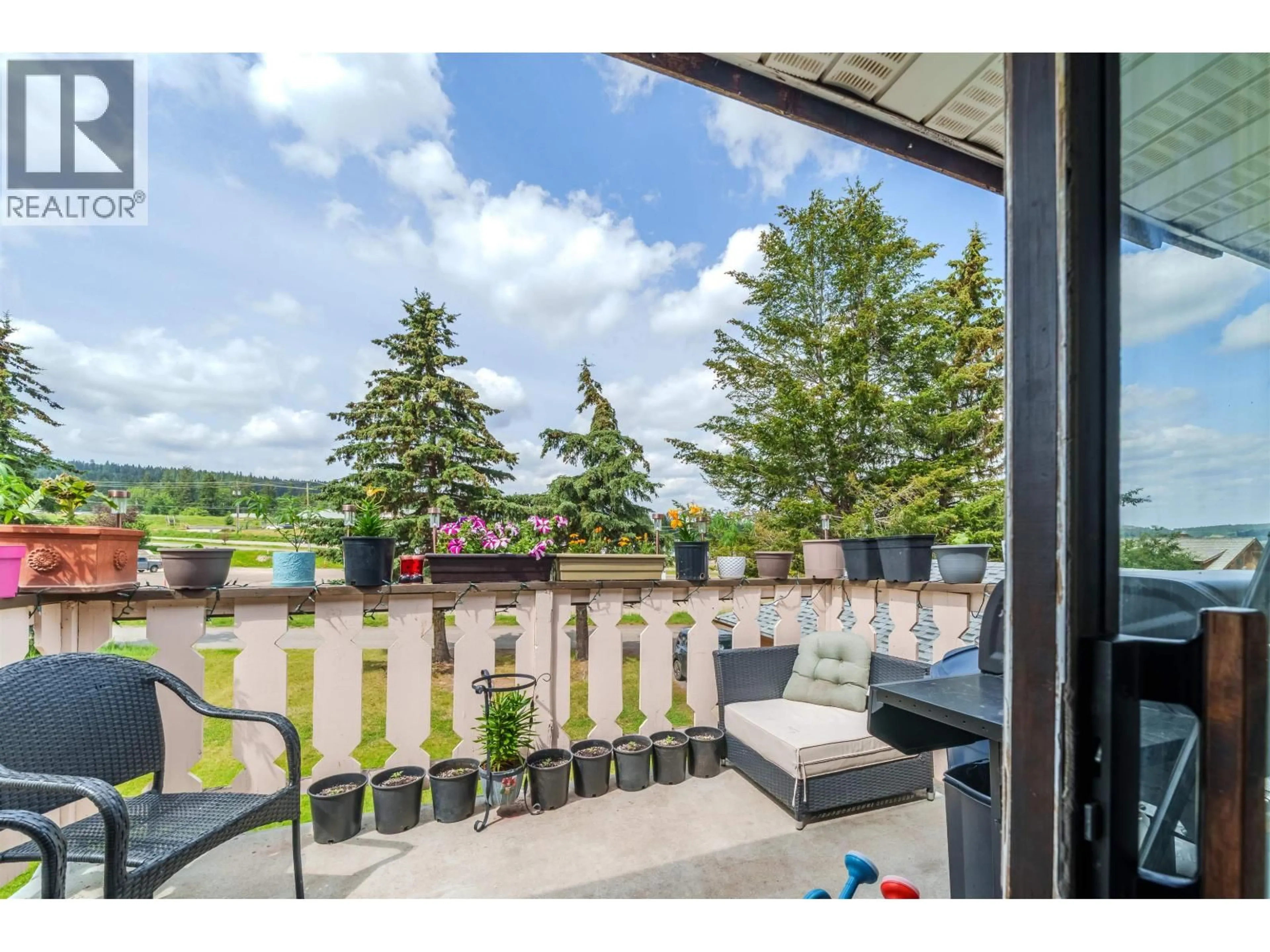 Patio, water/lake/river/ocean view for 720 CARIBOO TRAIL, 100 Mile House British Columbia V0K2E0