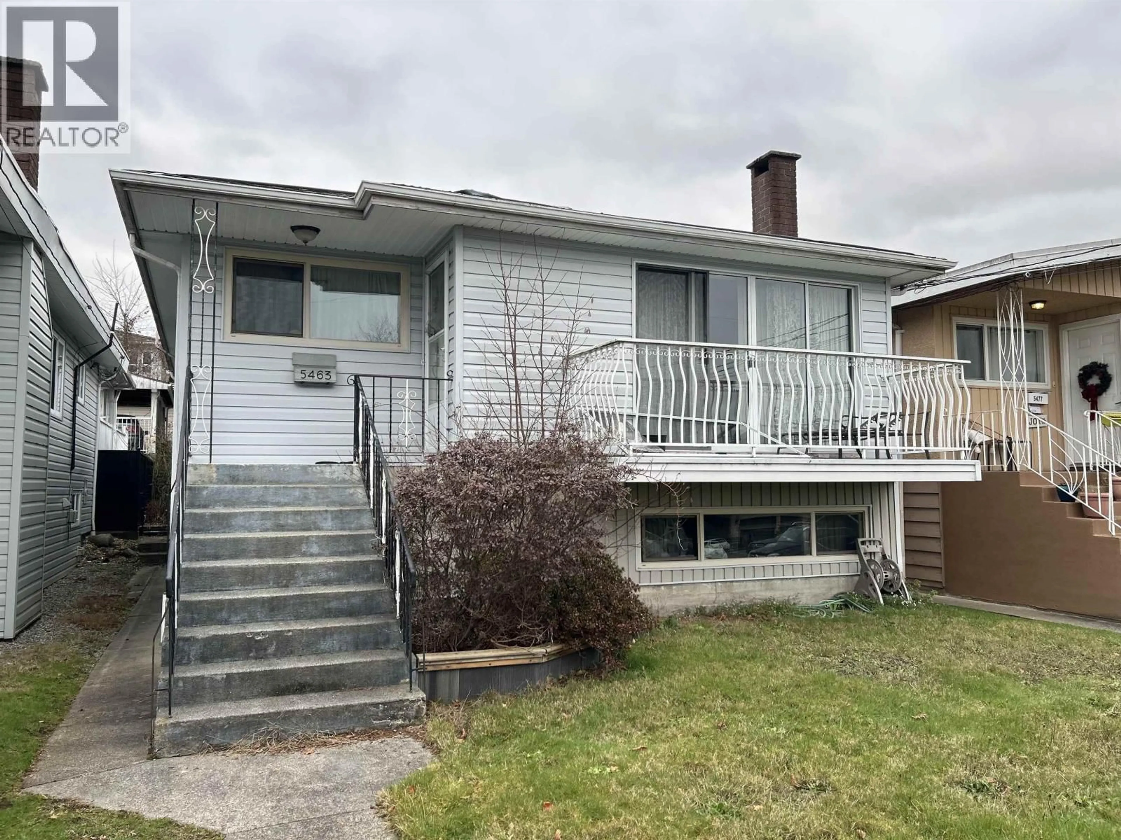 Home with vinyl exterior material, street for 5463 PORTLAND STREET, Burnaby British Columbia V5J2R5