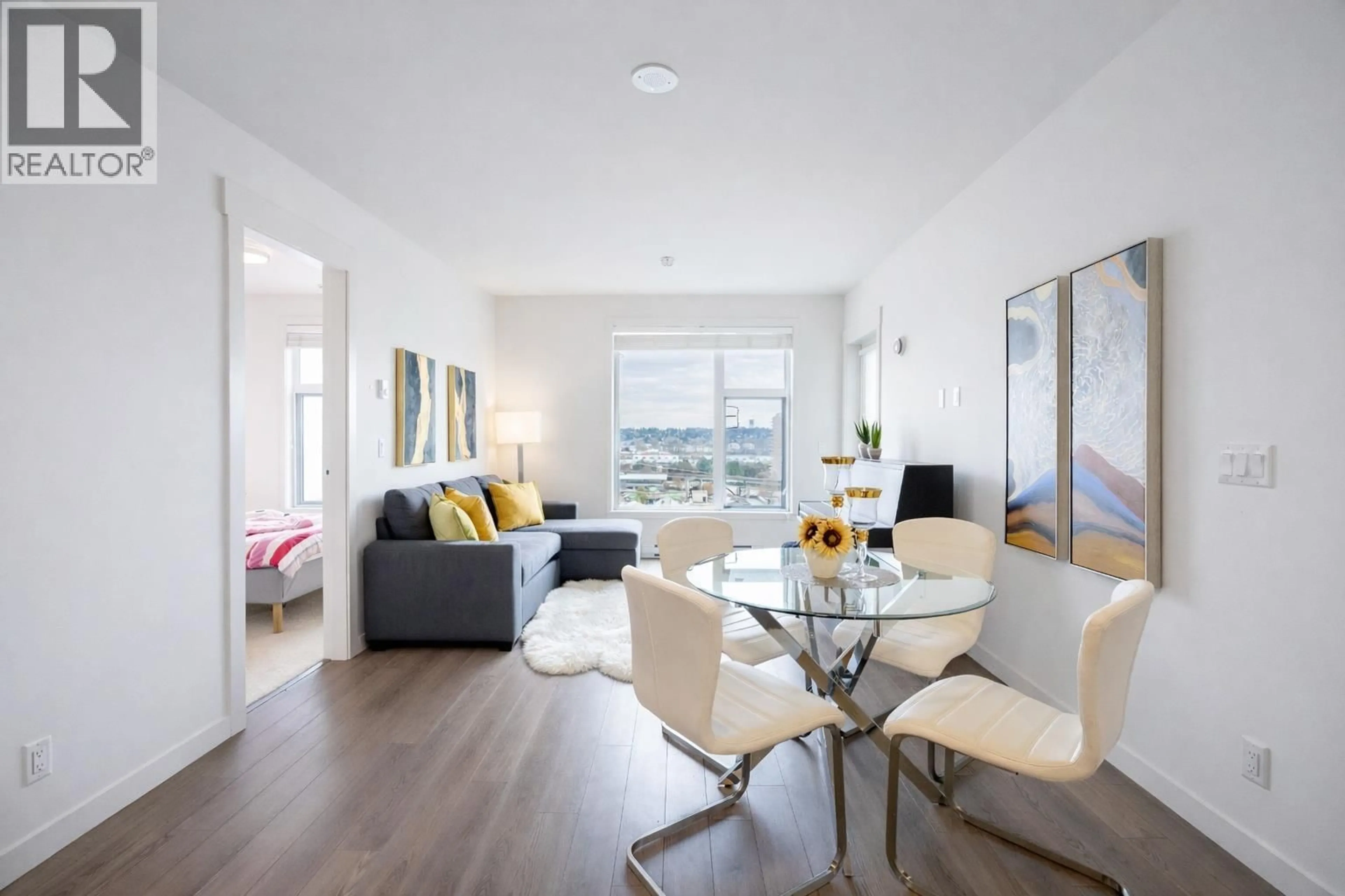 Living room with furniture, wood/laminate floor for 405 - 1012 AUCKLAND STREET, New Westminster British Columbia V3M0M3