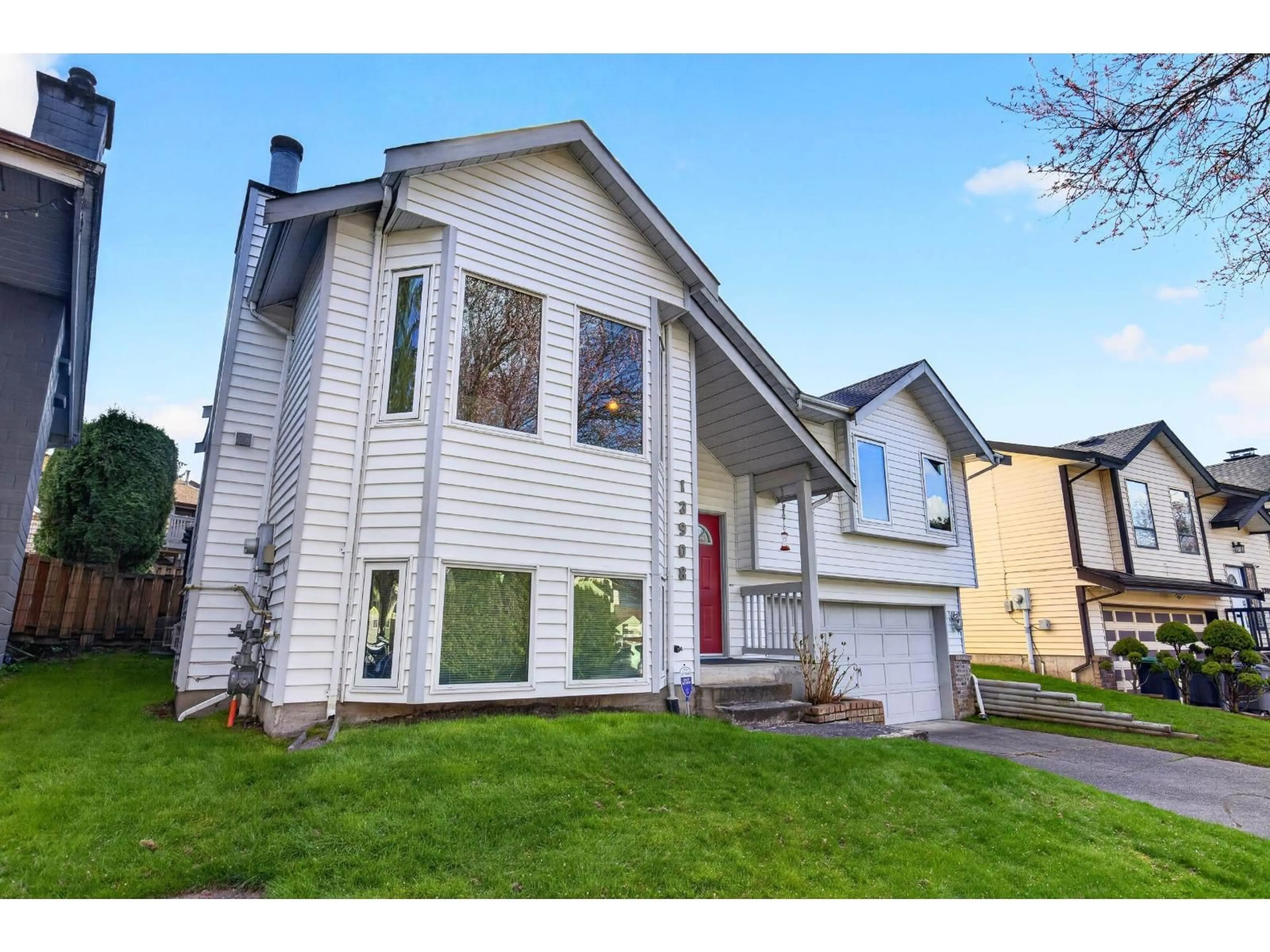 Home with vinyl exterior material, street for 13908 80B AVENUE, Surrey British Columbia V3W9B4