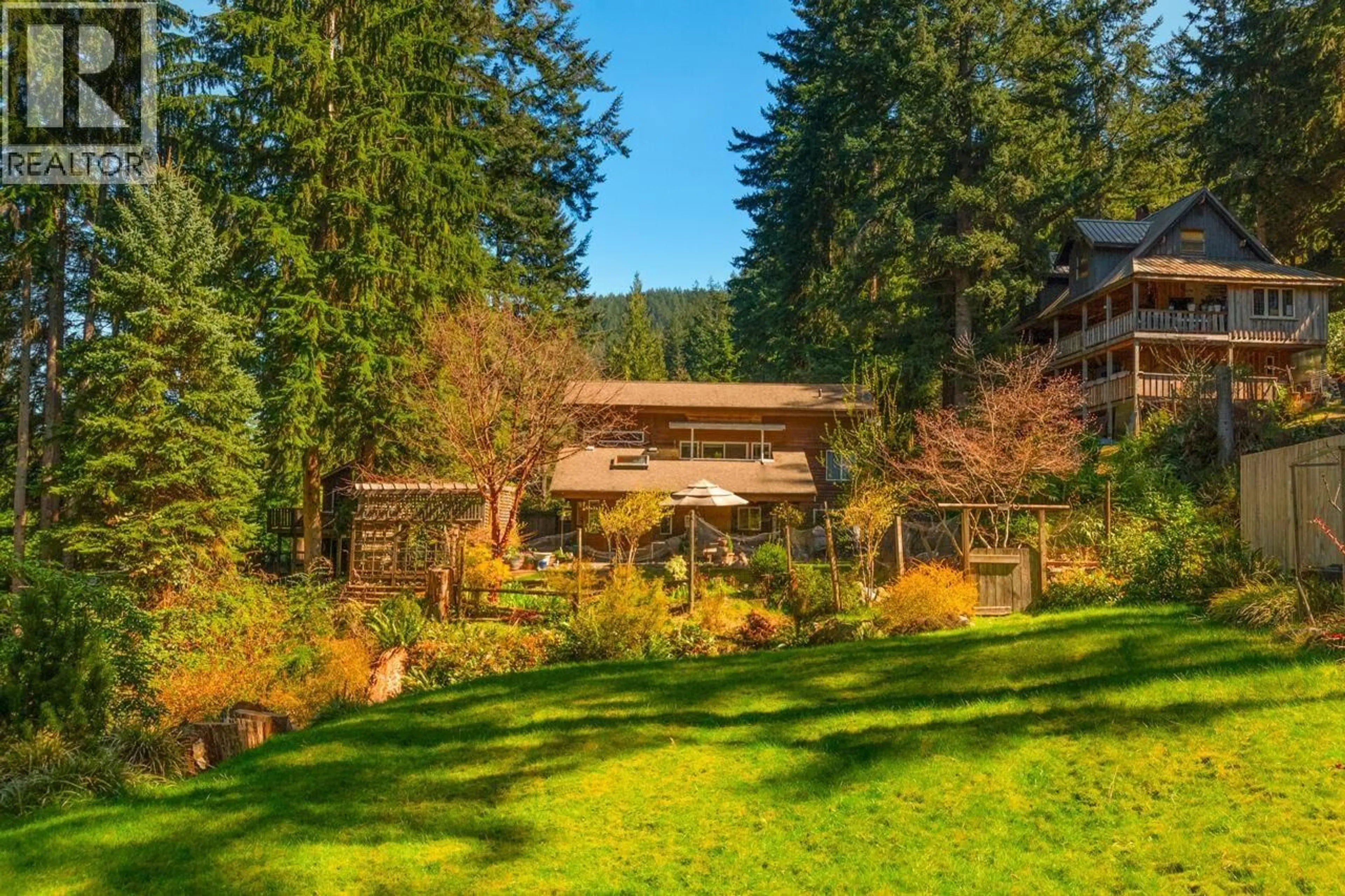 A pic from outside/outdoor area/front of a property/back of a property/a pic from drone, forest/trees view for 574 COWAN ROAD, Bowen Island British Columbia V0N1G2