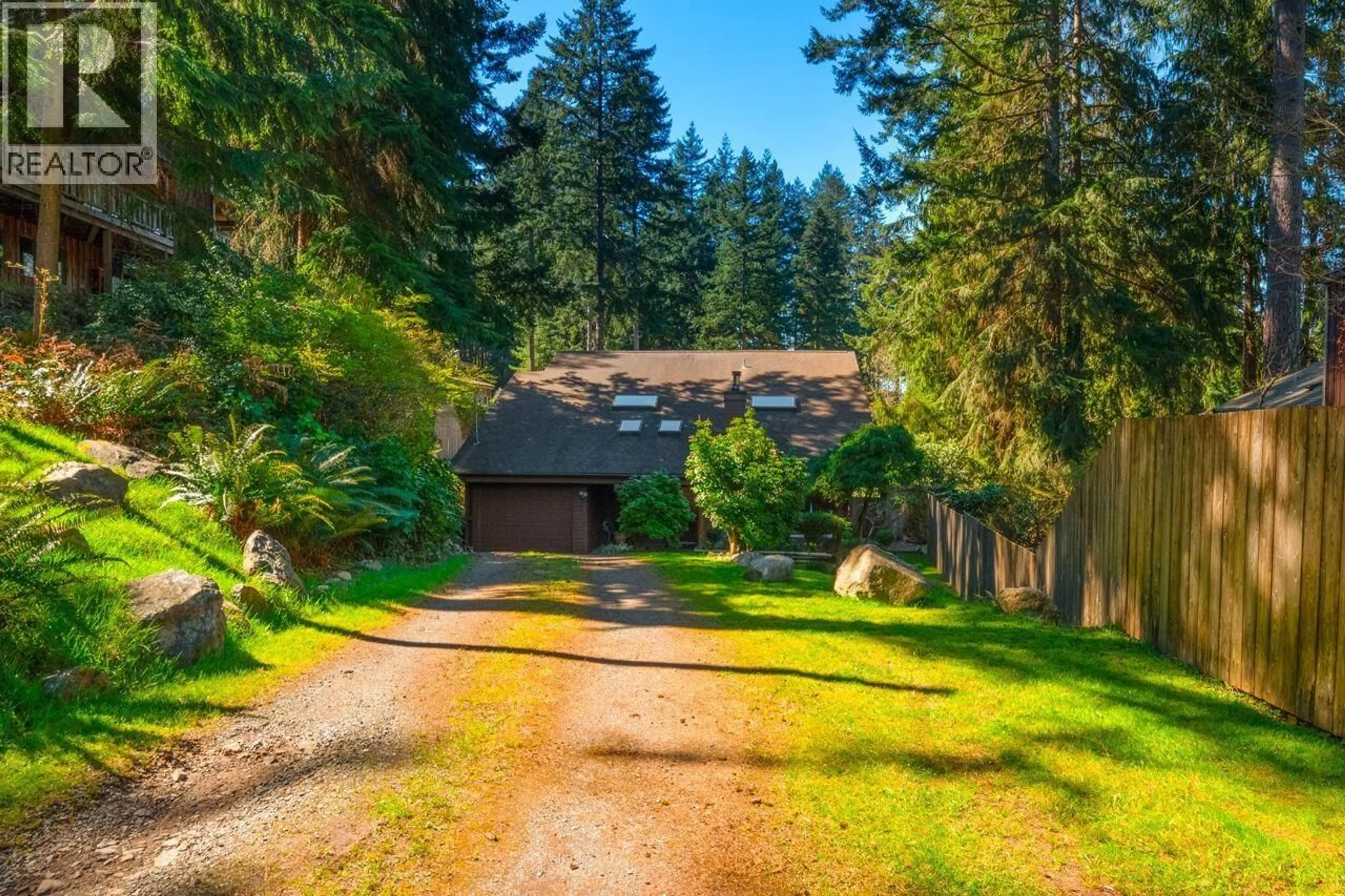 A pic from outside/outdoor area/front of a property/back of a property/a pic from drone, forest/trees view for 574 COWAN ROAD, Bowen Island British Columbia V0N1G2