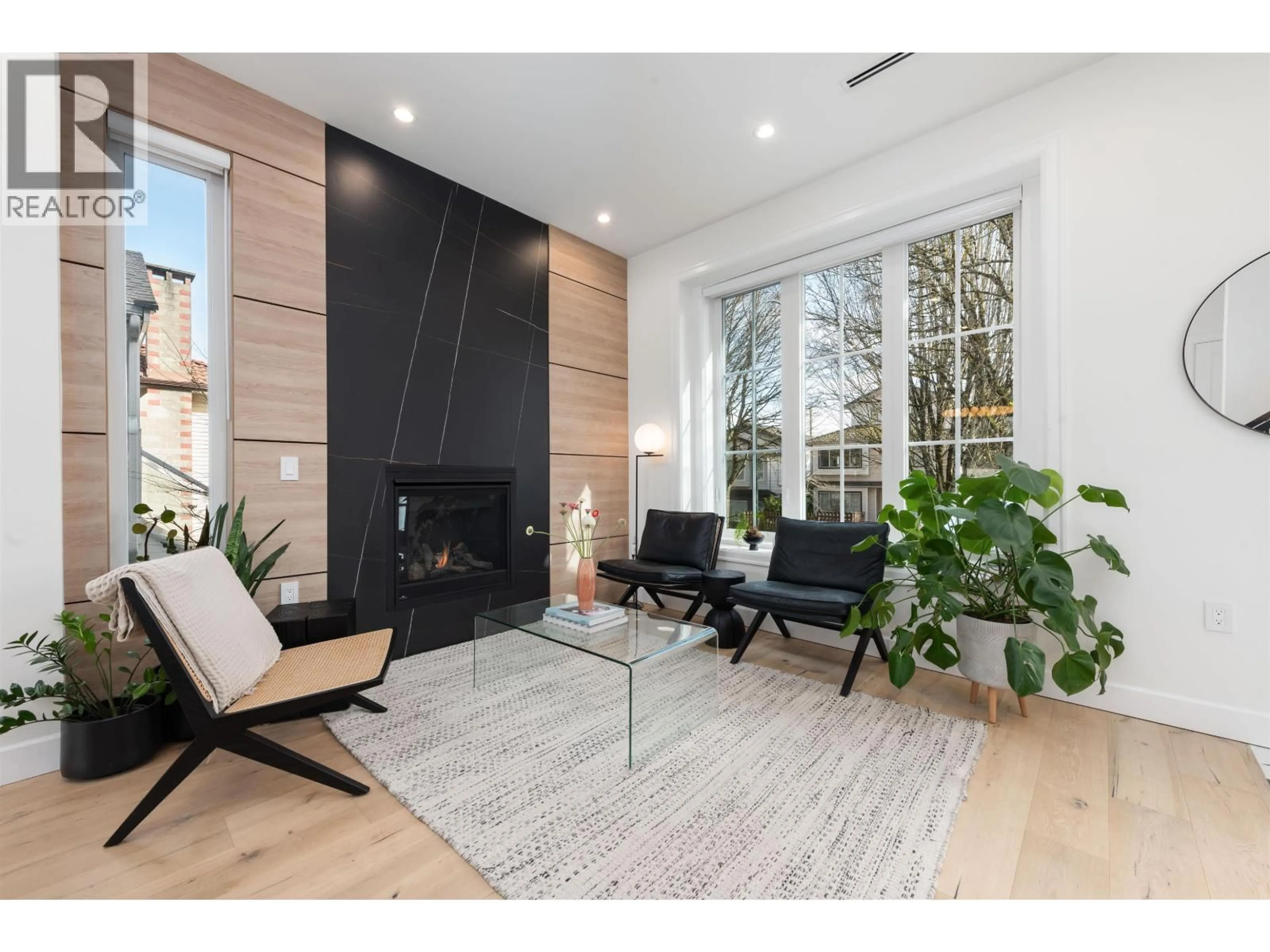 Living room with furniture, wood/laminate floor for 5059 SHERBROOKE STREET, Vancouver British Columbia V5W3M1