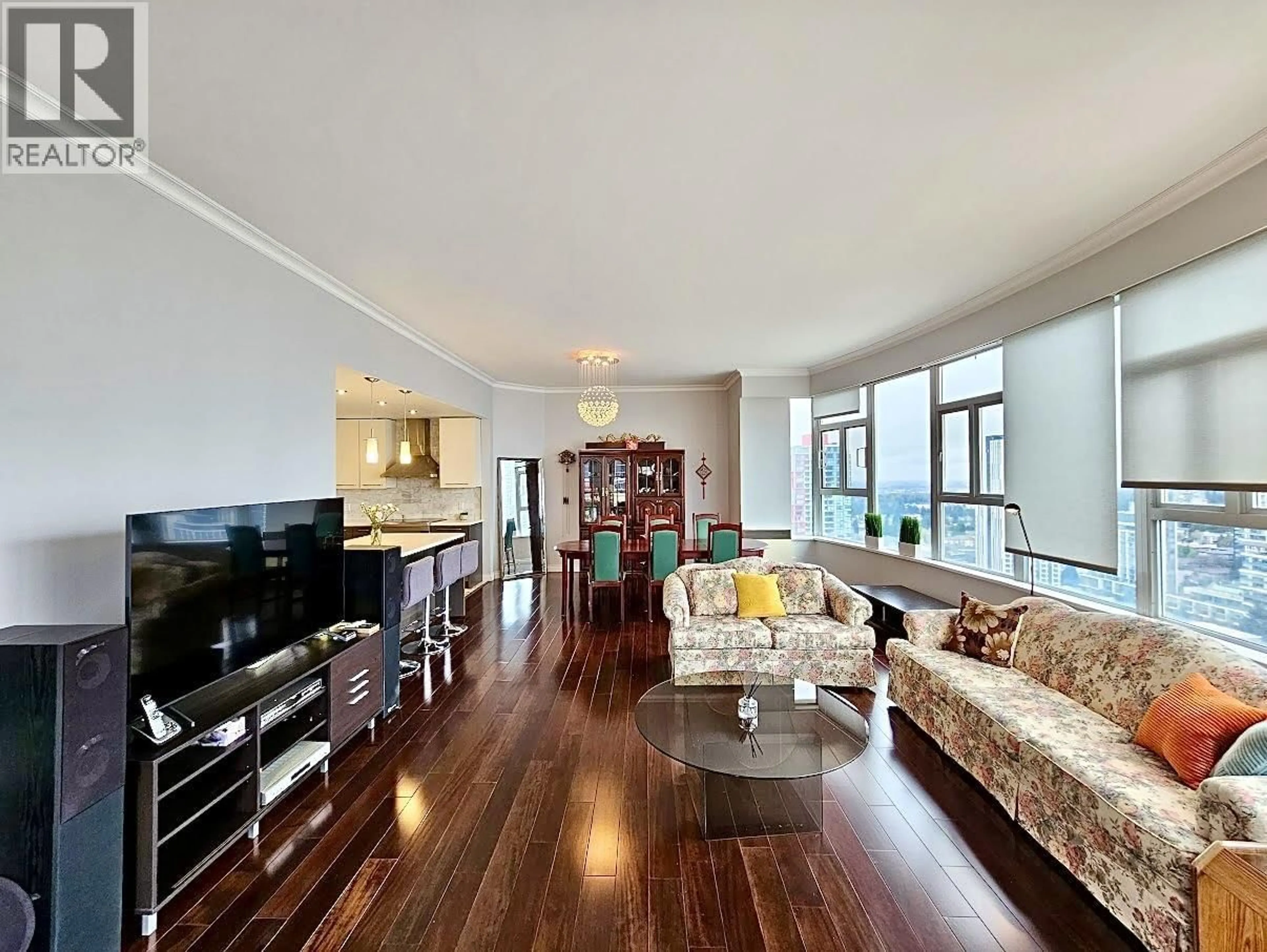 Living room with furniture, wood/laminate floor for 2500 - 6521 BONSOR AVENUE, Burnaby British Columbia V5H4N3