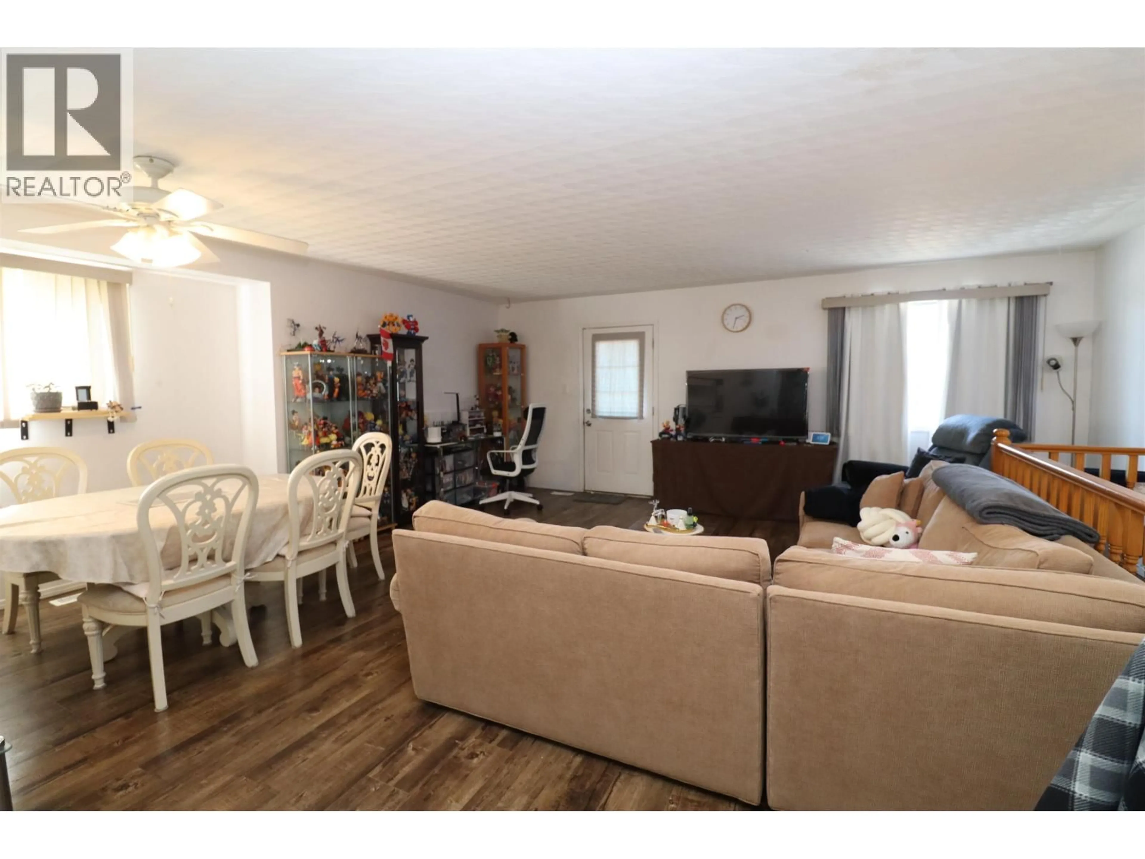 Living room with furniture, wood/laminate floor for 1934 SPRUCE STREET, Prince George British Columbia V2L2R4