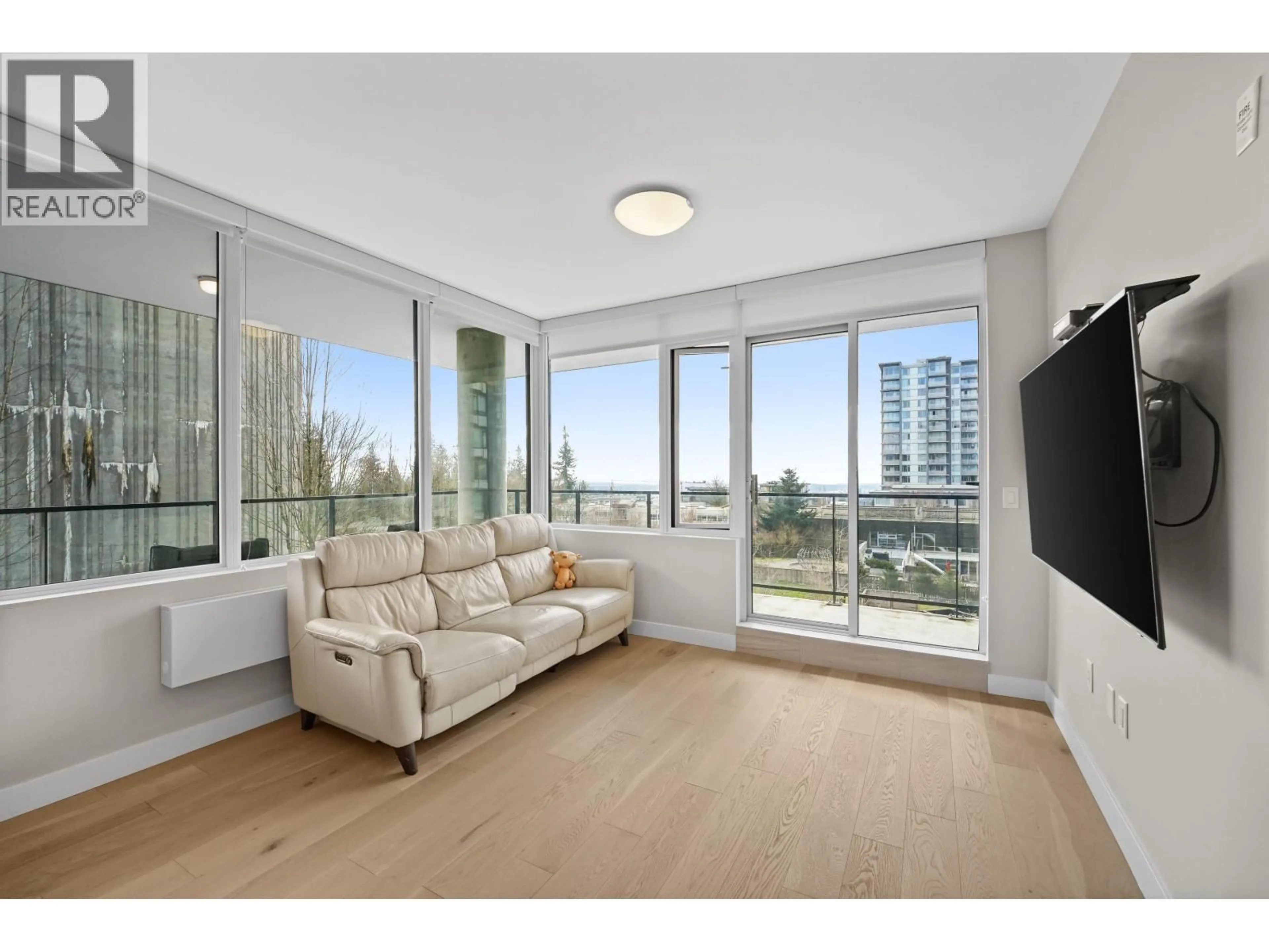 Living room with furniture, unknown for 604 - 8761 UNIVERSITY CRESCENT, Burnaby British Columbia V5A0G3