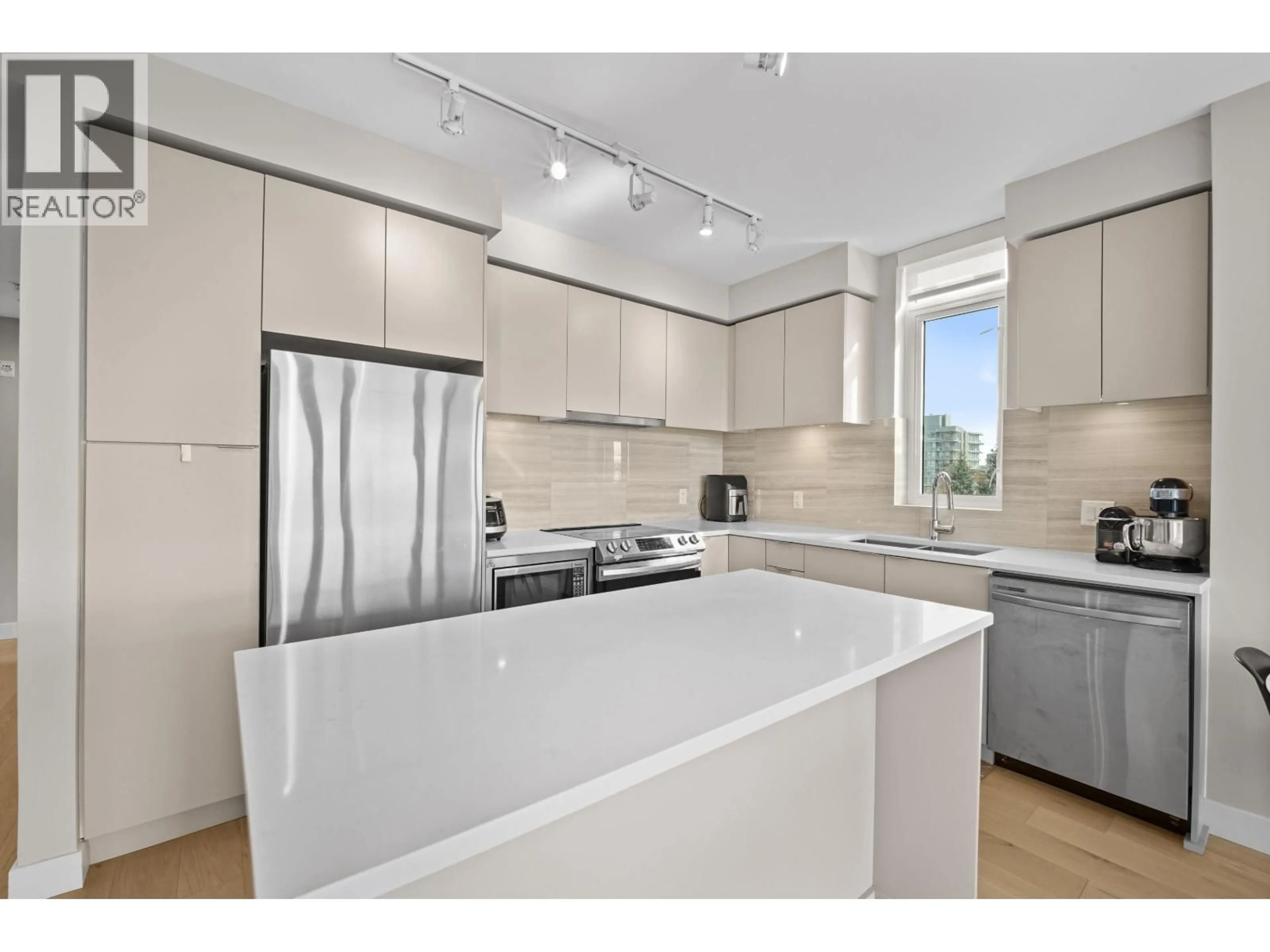 Open concept kitchen, unknown for 604 - 8761 UNIVERSITY CRESCENT, Burnaby British Columbia V5A0G3