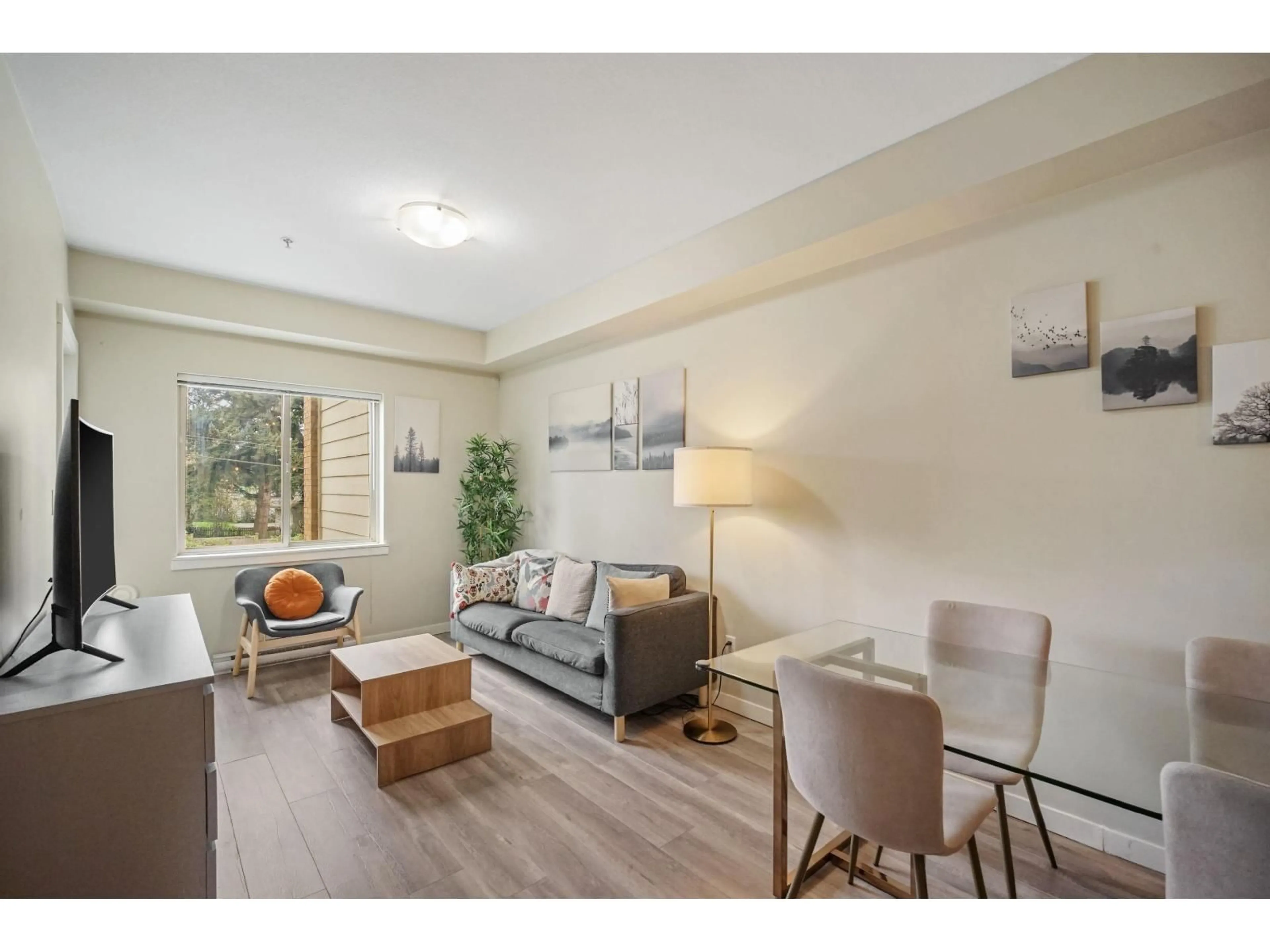 Living room with furniture, wood/laminate floor for 229 - 13789 107A AVENUE, Surrey British Columbia V3T0B8