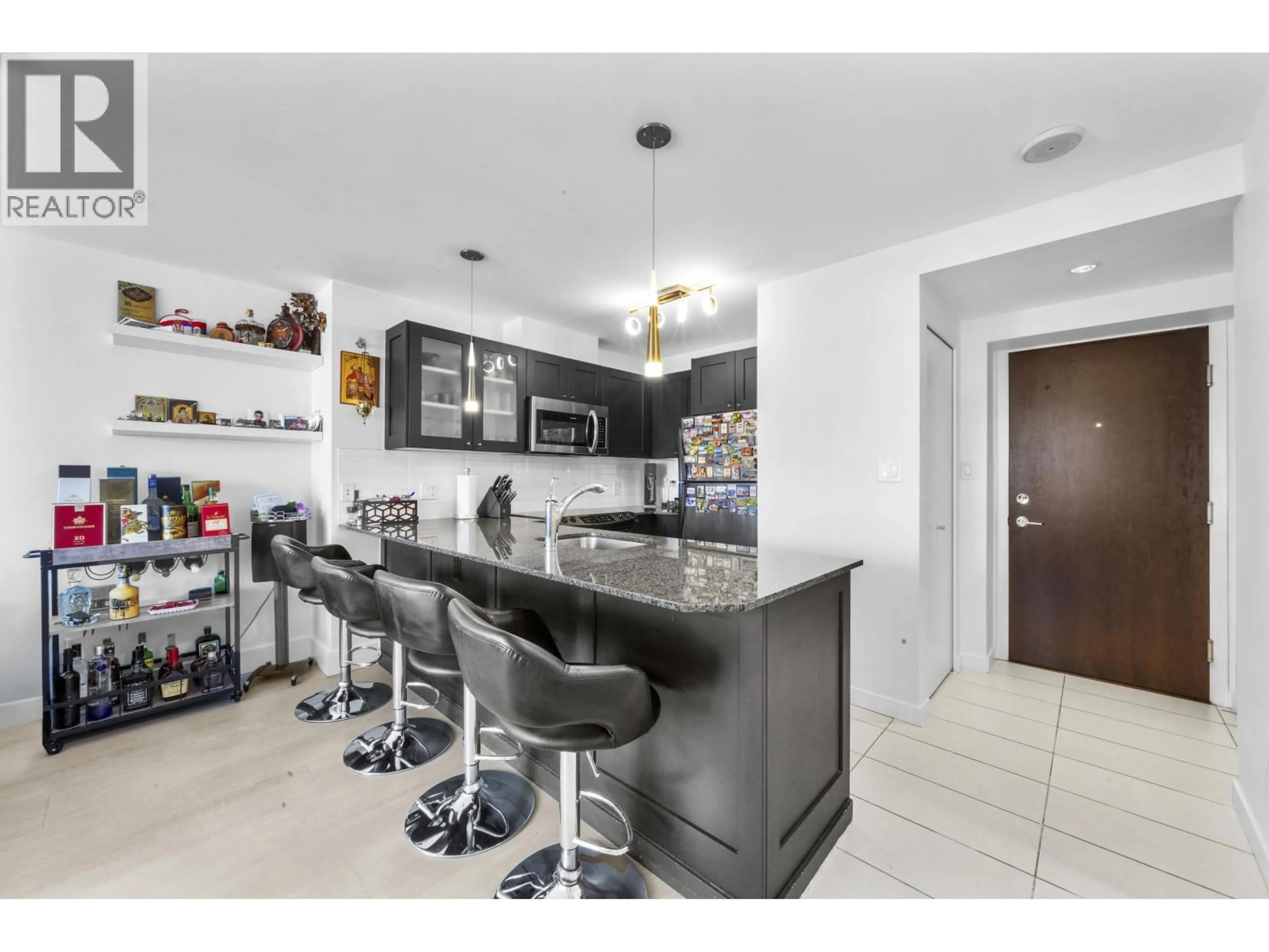 Open concept kitchen, ceramic/tile floor for 502 - 7225 ACORN AVENUE, Burnaby British Columbia V5E0A9