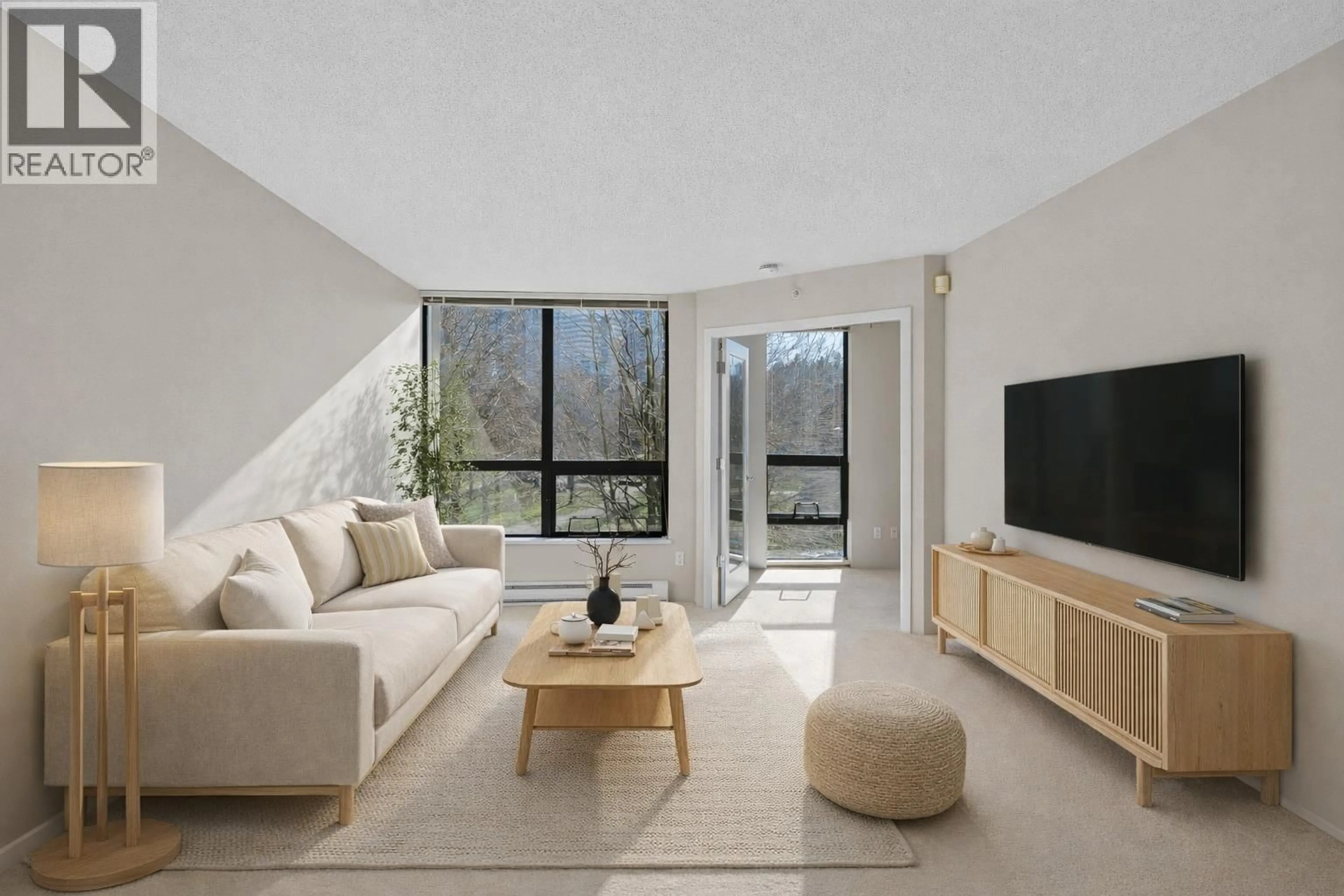 Living room with furniture, unknown for 303 - 3588 CROWLEY DRIVE, Vancouver British Columbia V5R6H3