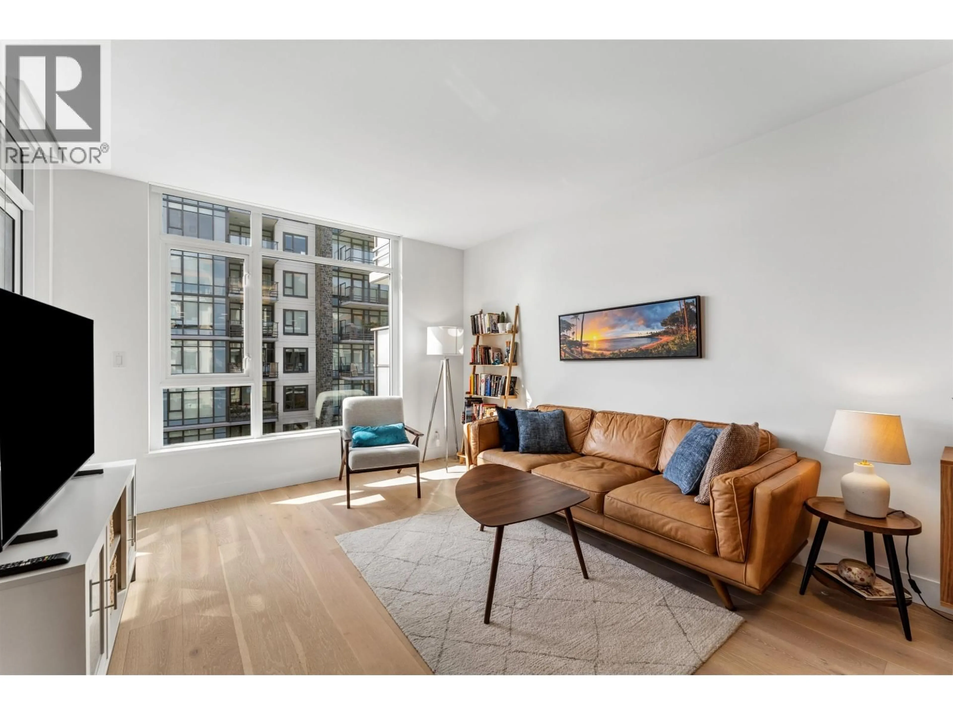 Living room with furniture, unknown for 403 - 2780 VALLEY CENTRE AVENUE, North Vancouver British Columbia V7J0C4