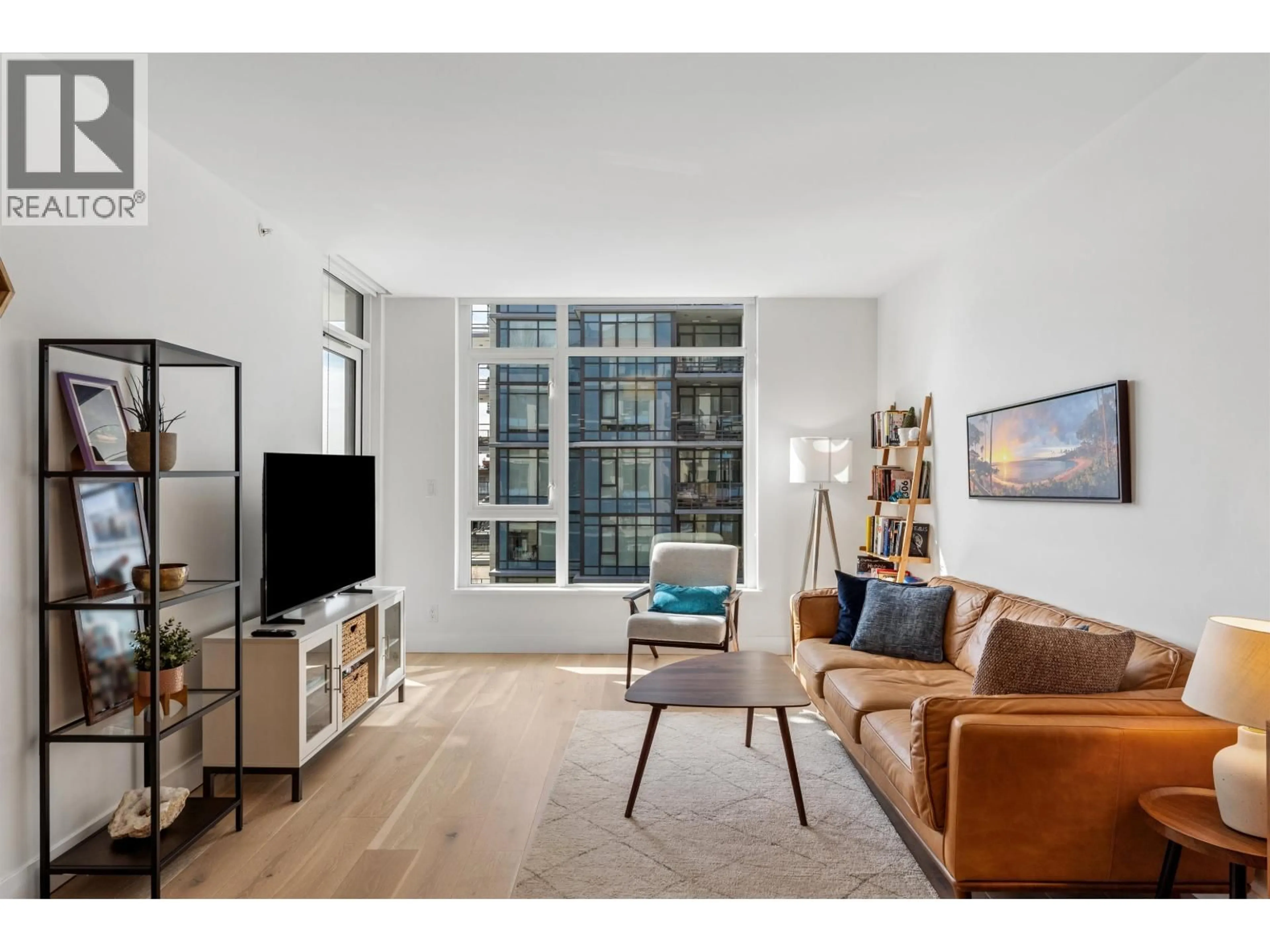 Living room with furniture, unknown for 403 - 2780 VALLEY CENTRE AVENUE, North Vancouver British Columbia V7J0C4