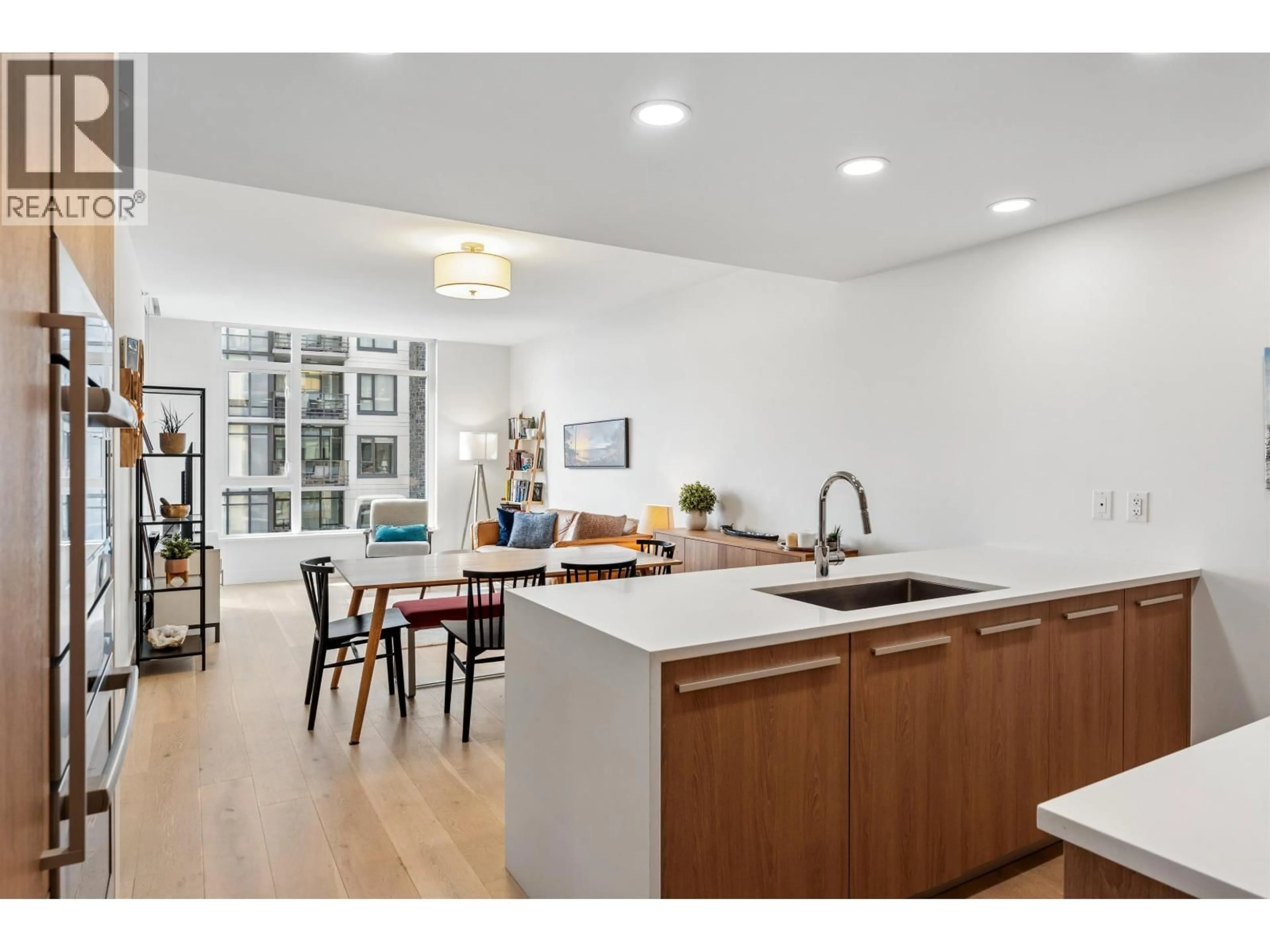 Open concept kitchen, unknown for 403 - 2780 VALLEY CENTRE AVENUE, North Vancouver British Columbia V7J0C4