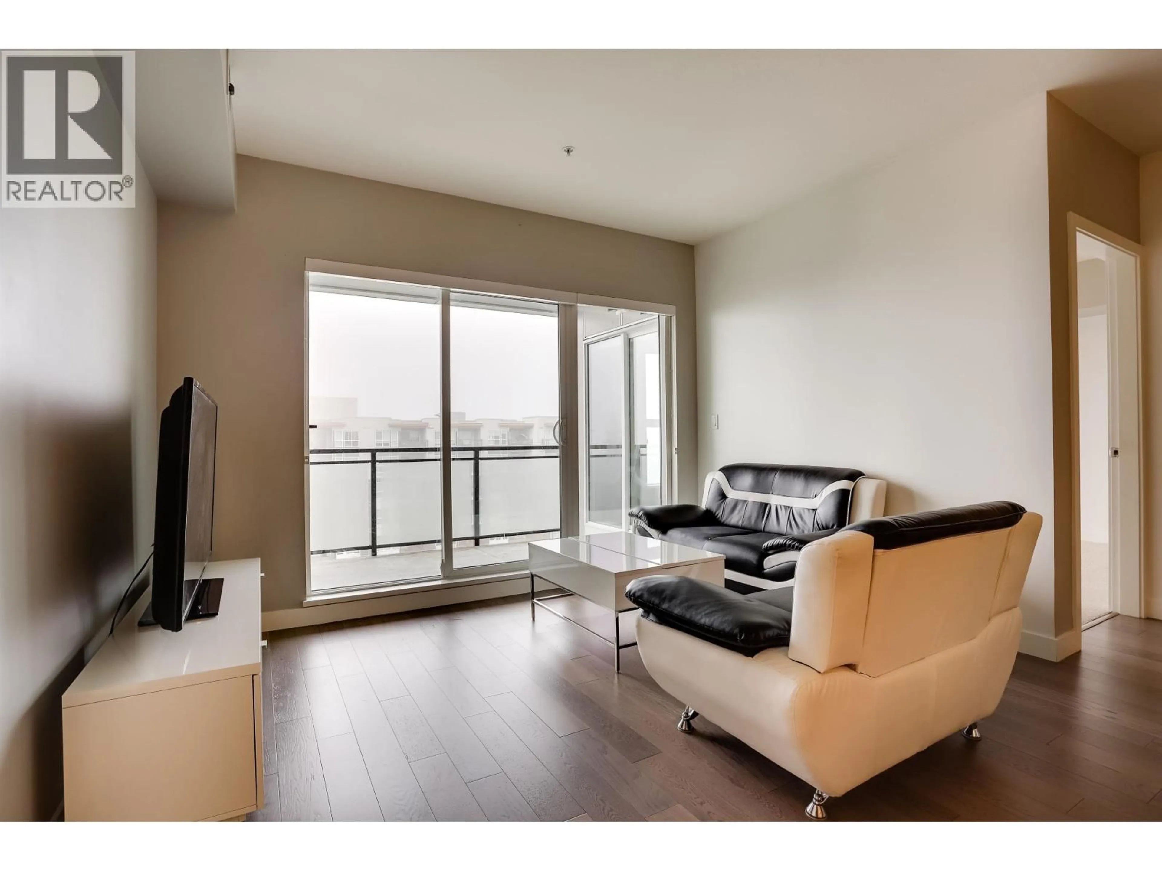 Living room with furniture, wood/laminate floor for 608 - 10177 RIVER DRIVE, Richmond British Columbia V6X0S2
