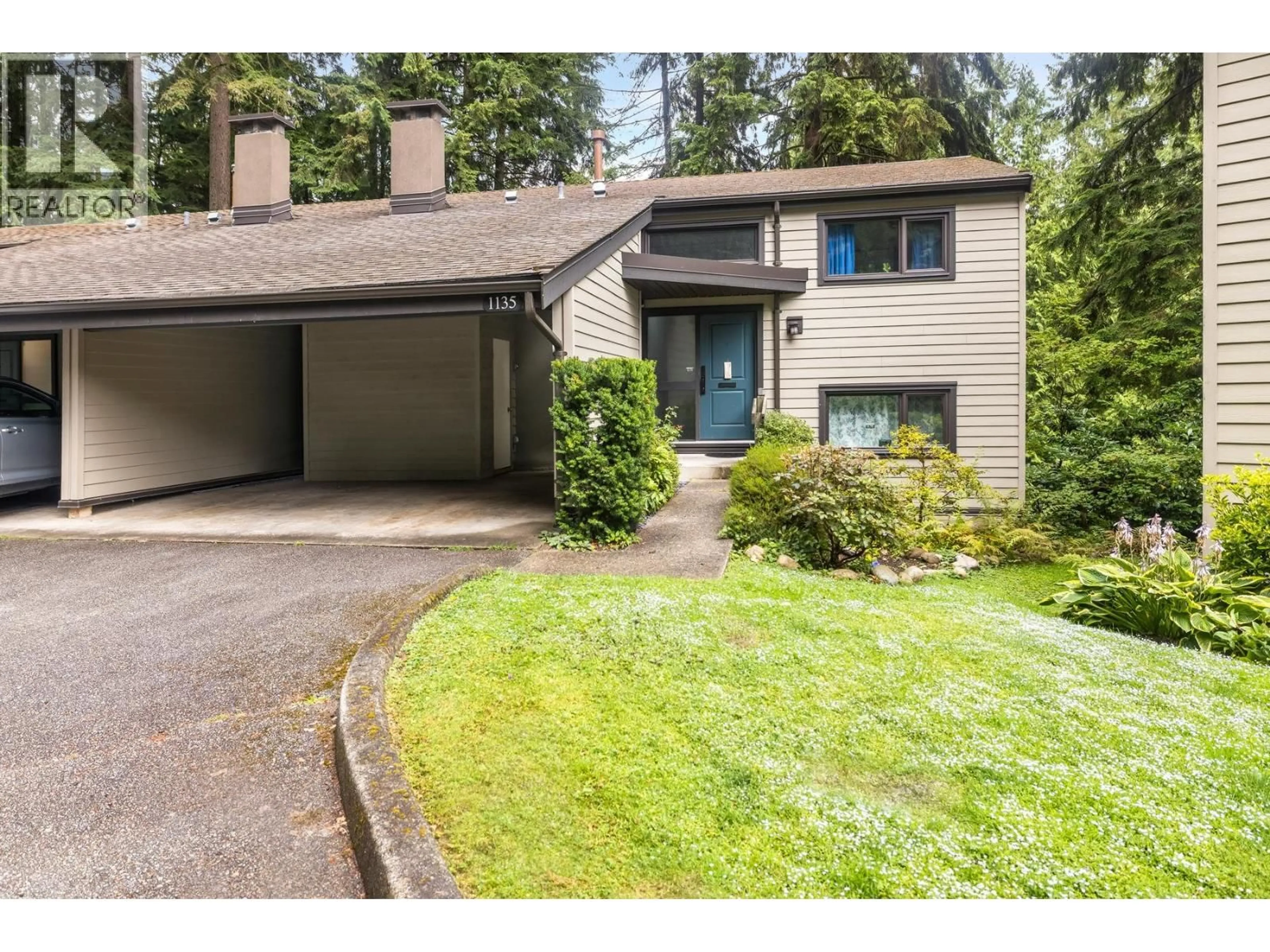 Home with vinyl exterior material, street for 1135 HERITAGE BOULEVARD, North Vancouver British Columbia V7J3G8
