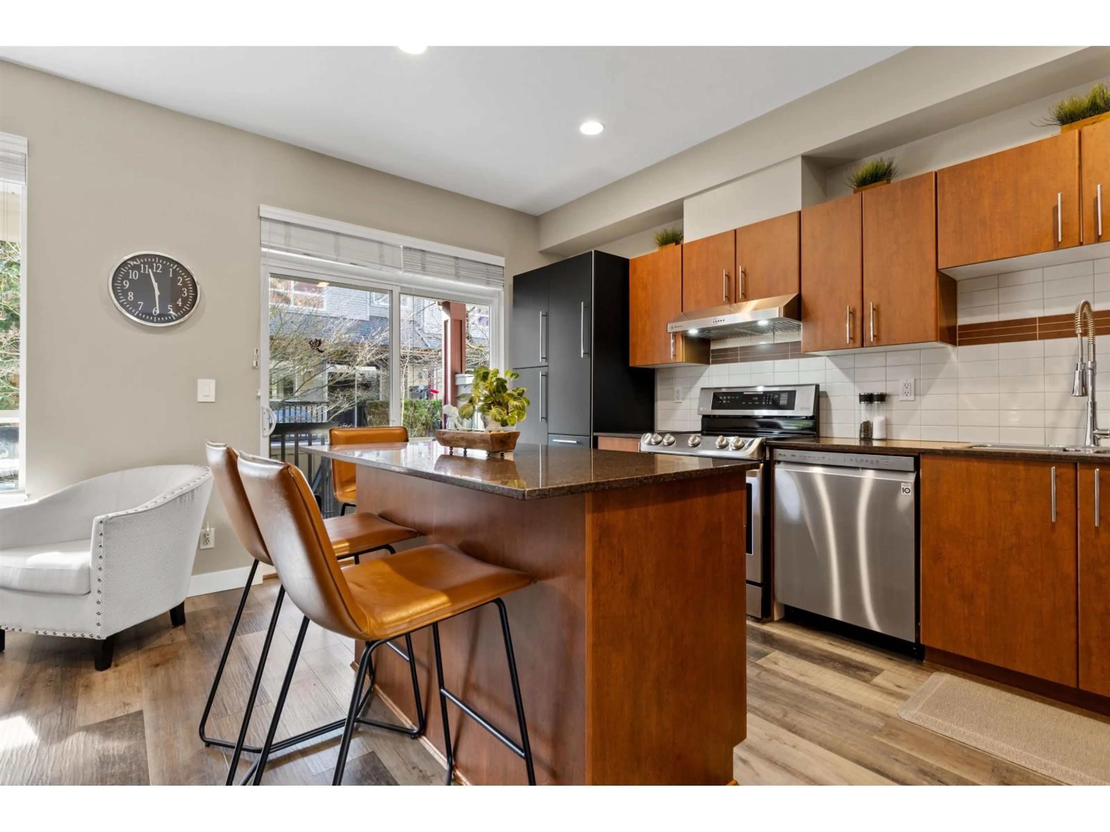 Open concept kitchen, wood/laminate floor for 12 - 16772 61 AVENUE, Surrey British Columbia V3S4P2