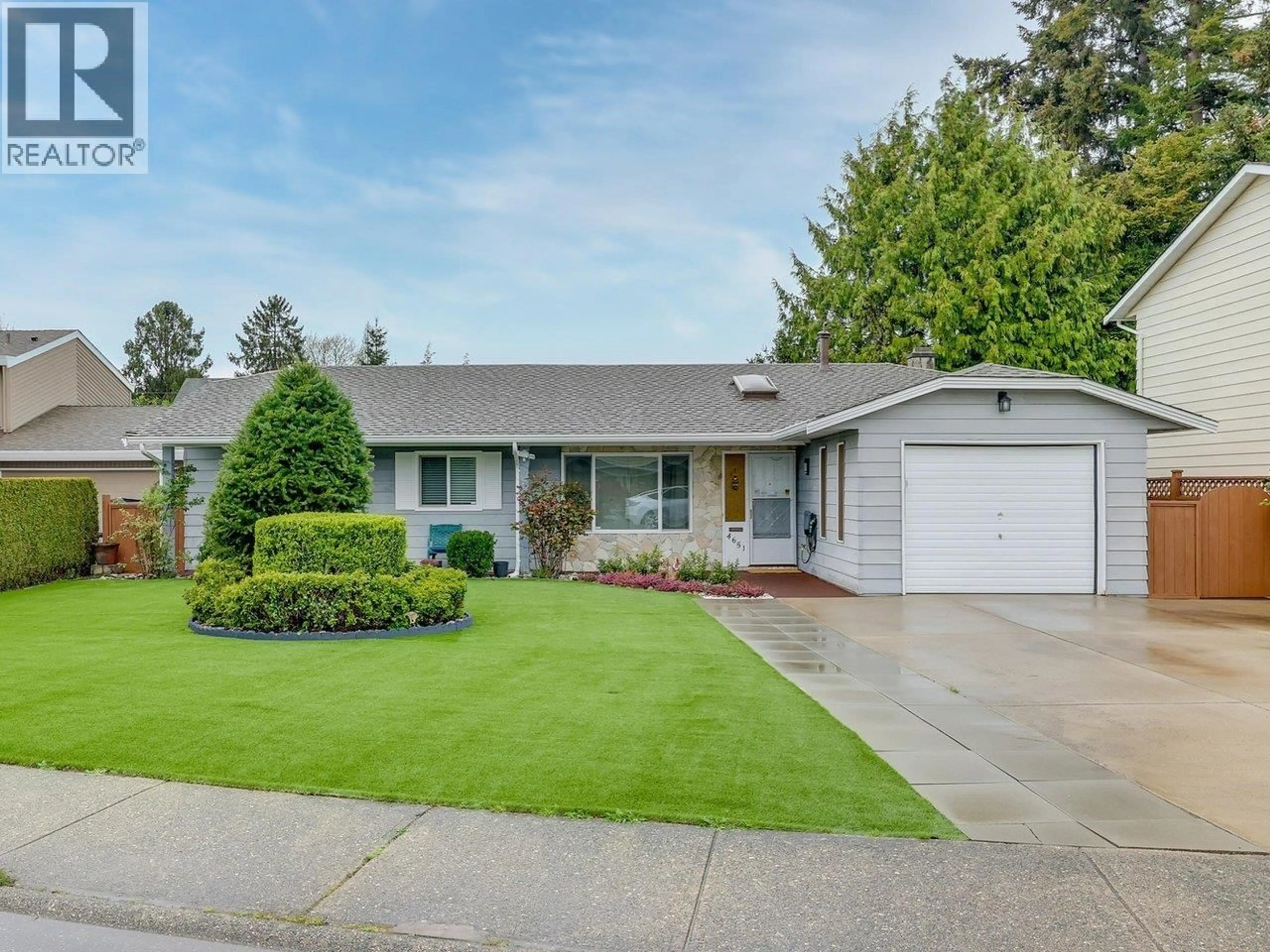 Home with vinyl exterior material, street for 4651 56 STREET, Ladner British Columbia V4K3X4