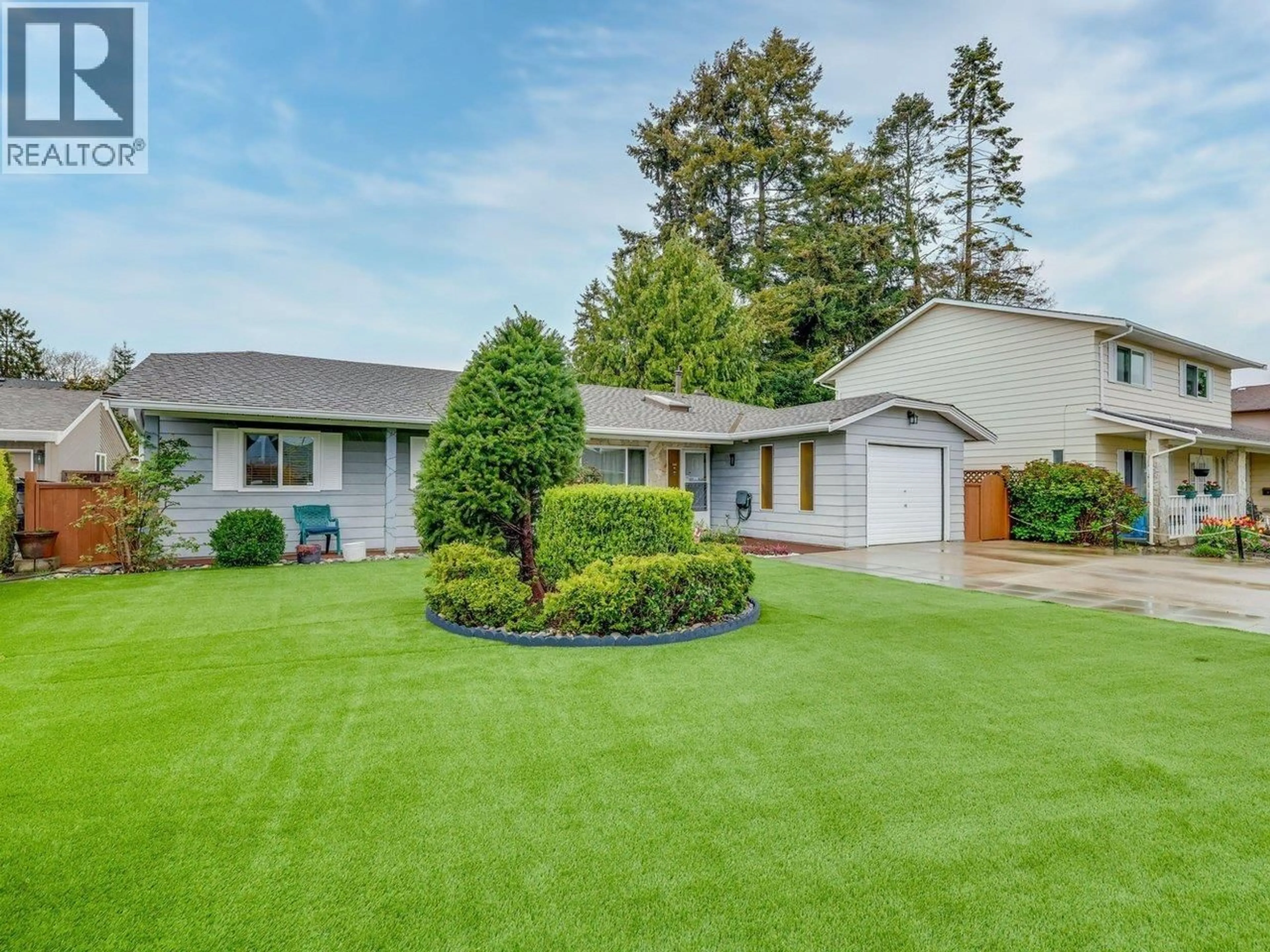 Home with vinyl exterior material, street for 4651 56 STREET, Ladner British Columbia V4K3X4