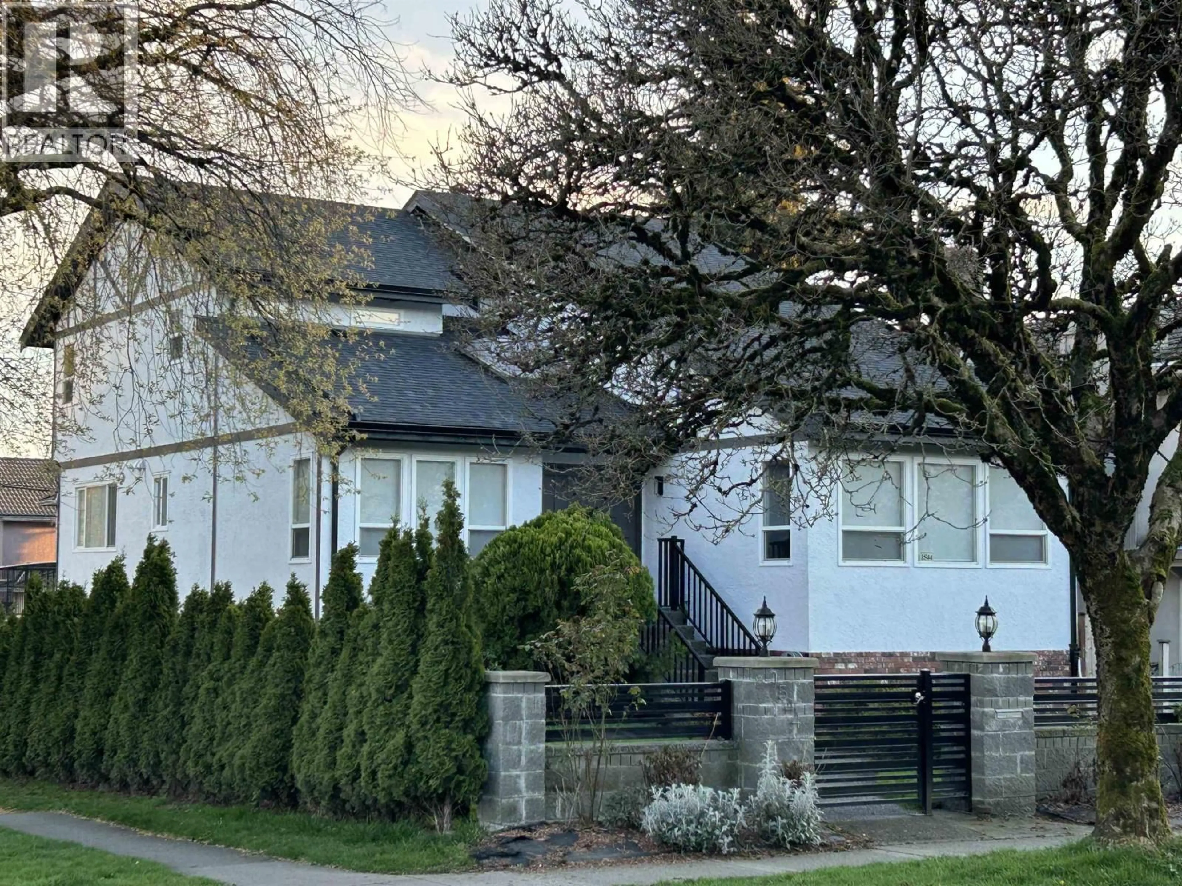 A pic from outside/outdoor area/front of a property/back of a property/a pic from drone, street for 1544 68TH AVENUE, Vancouver British Columbia V6P2V5