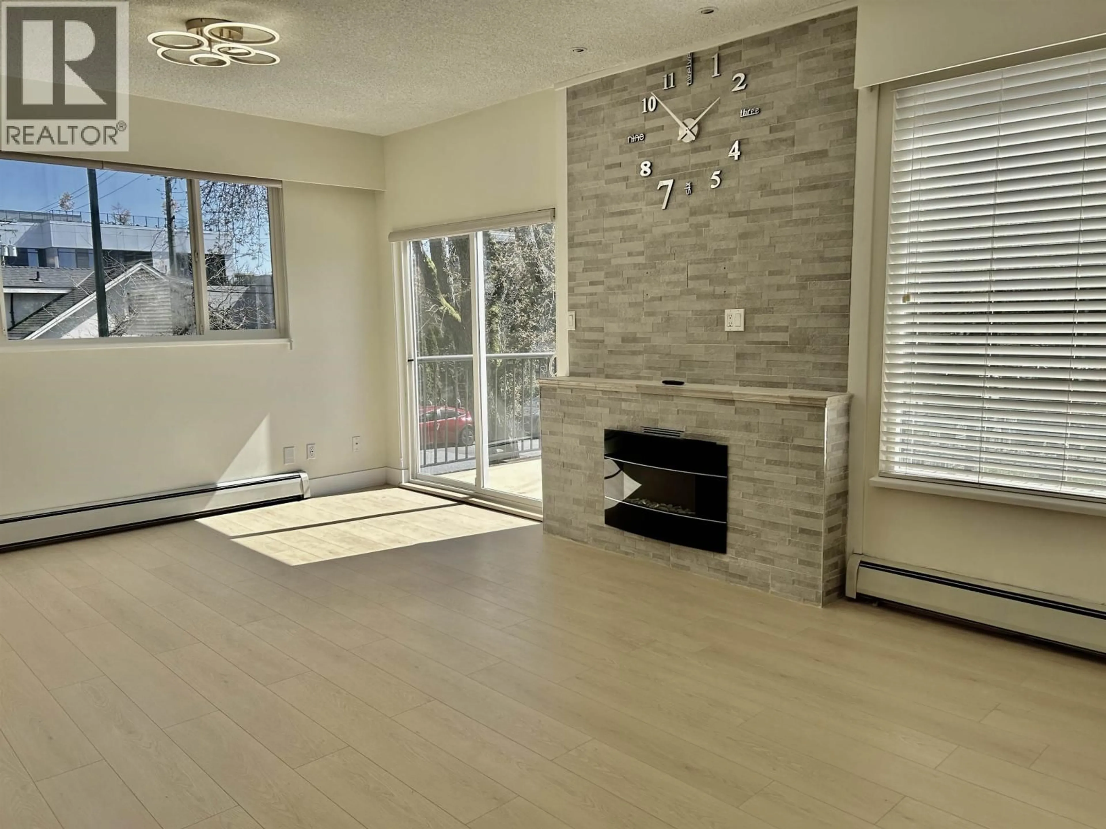 Living room with furniture, wood/laminate floor for 1544 68TH AVENUE, Vancouver British Columbia V6P2V5