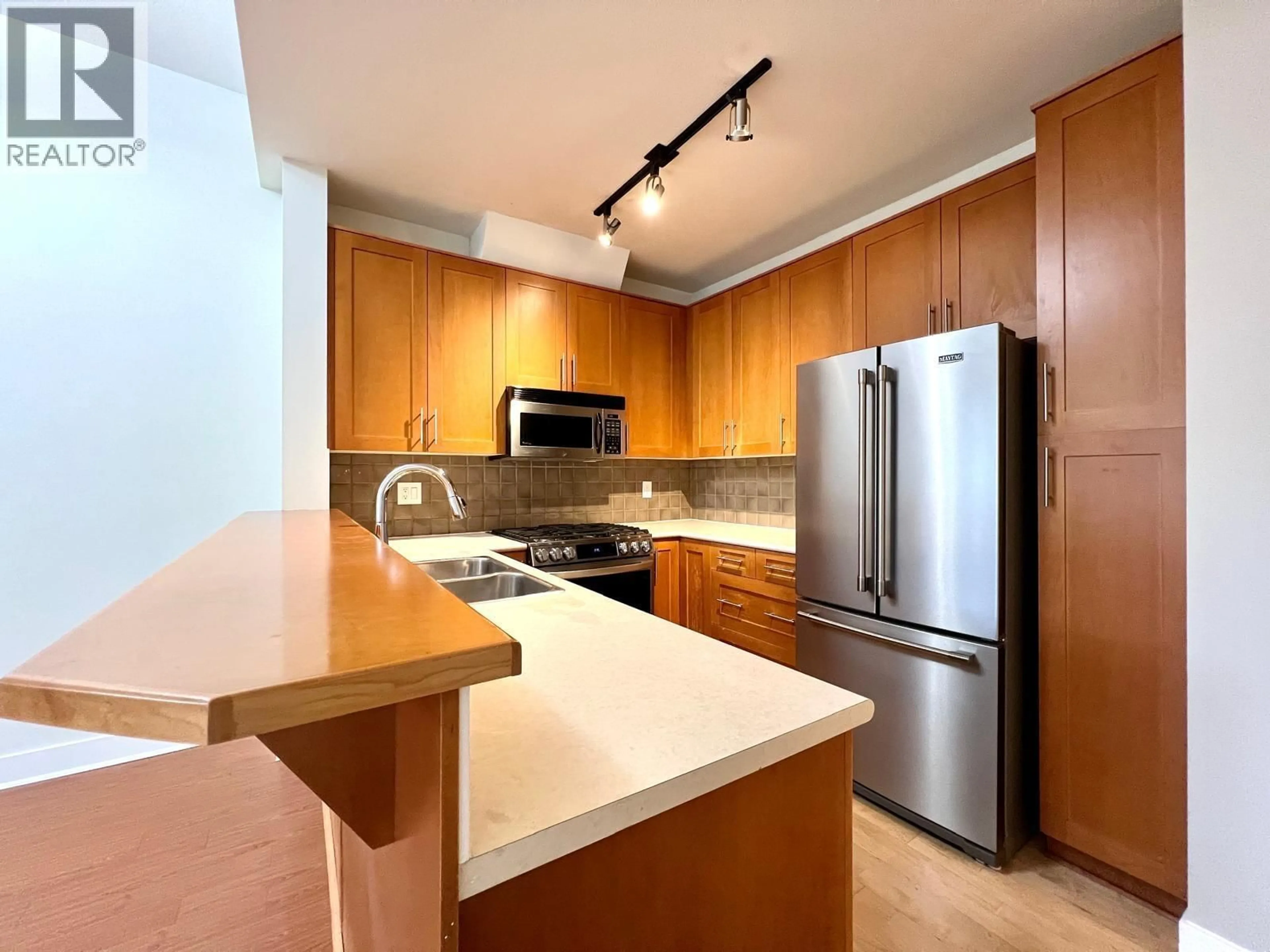 Standard kitchen, wood/laminate floor for 1314 - 4655 VALLEY DRIVE, Vancouver British Columbia V6J5L6