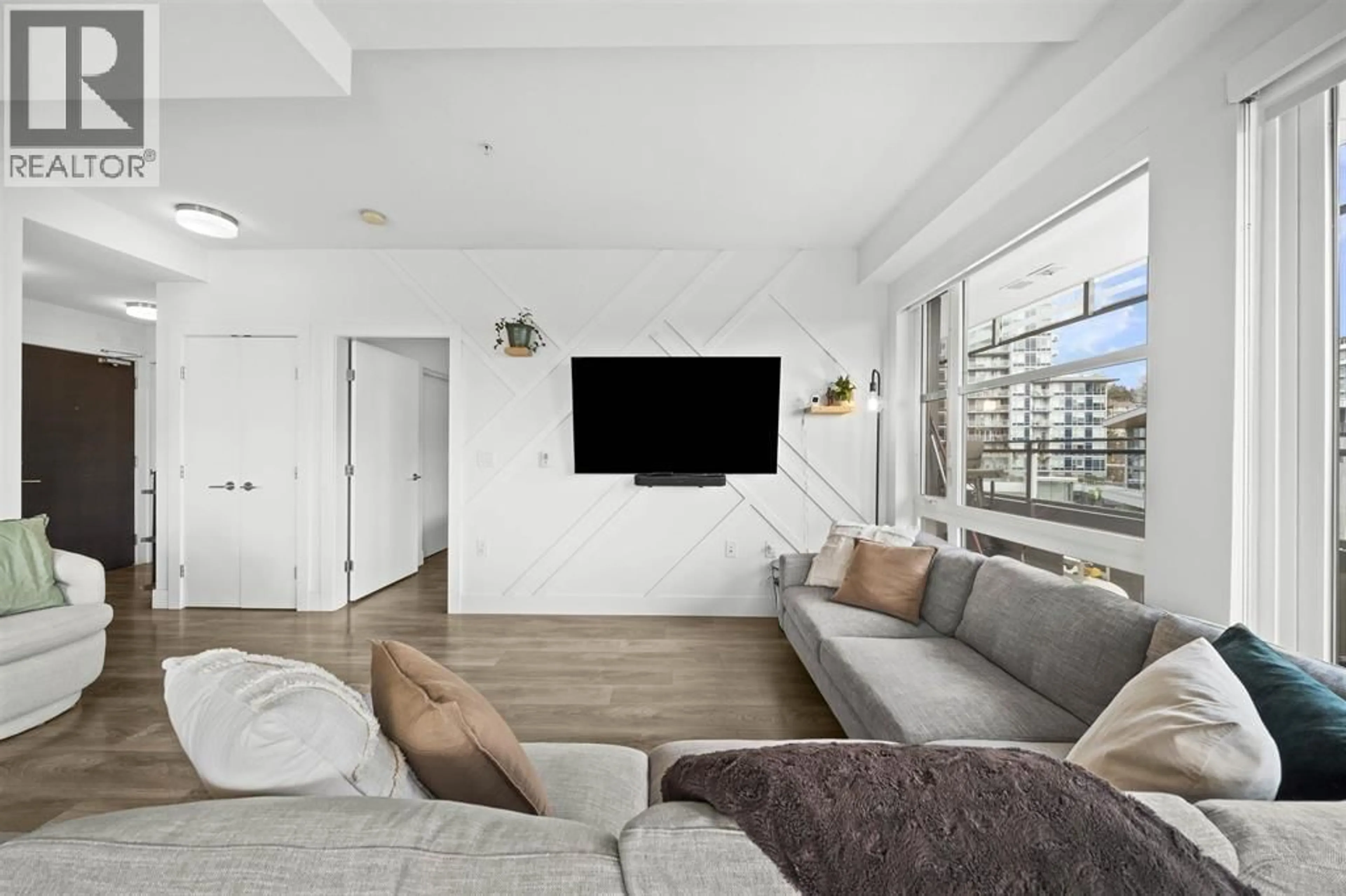 Living room with furniture, unknown for 615 - 3488 SAWMILL CRESCENT, Vancouver British Columbia V5S0C7