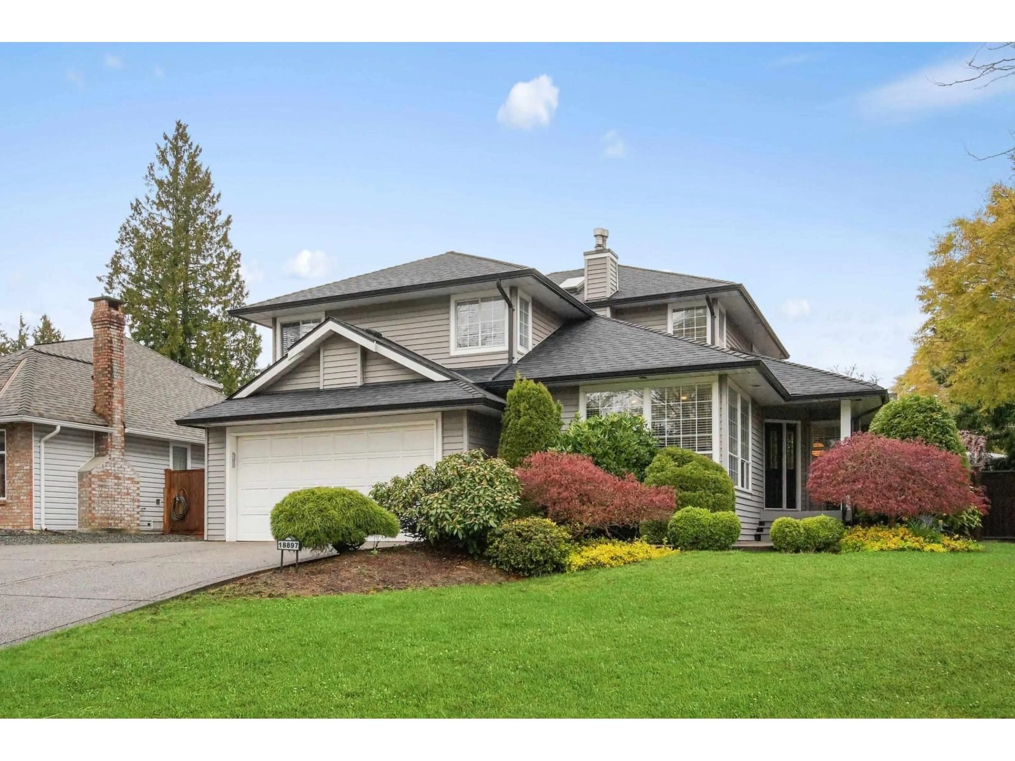 Home with vinyl exterior material, street for 18897 62A AVENUE, Surrey British Columbia V3S7T7